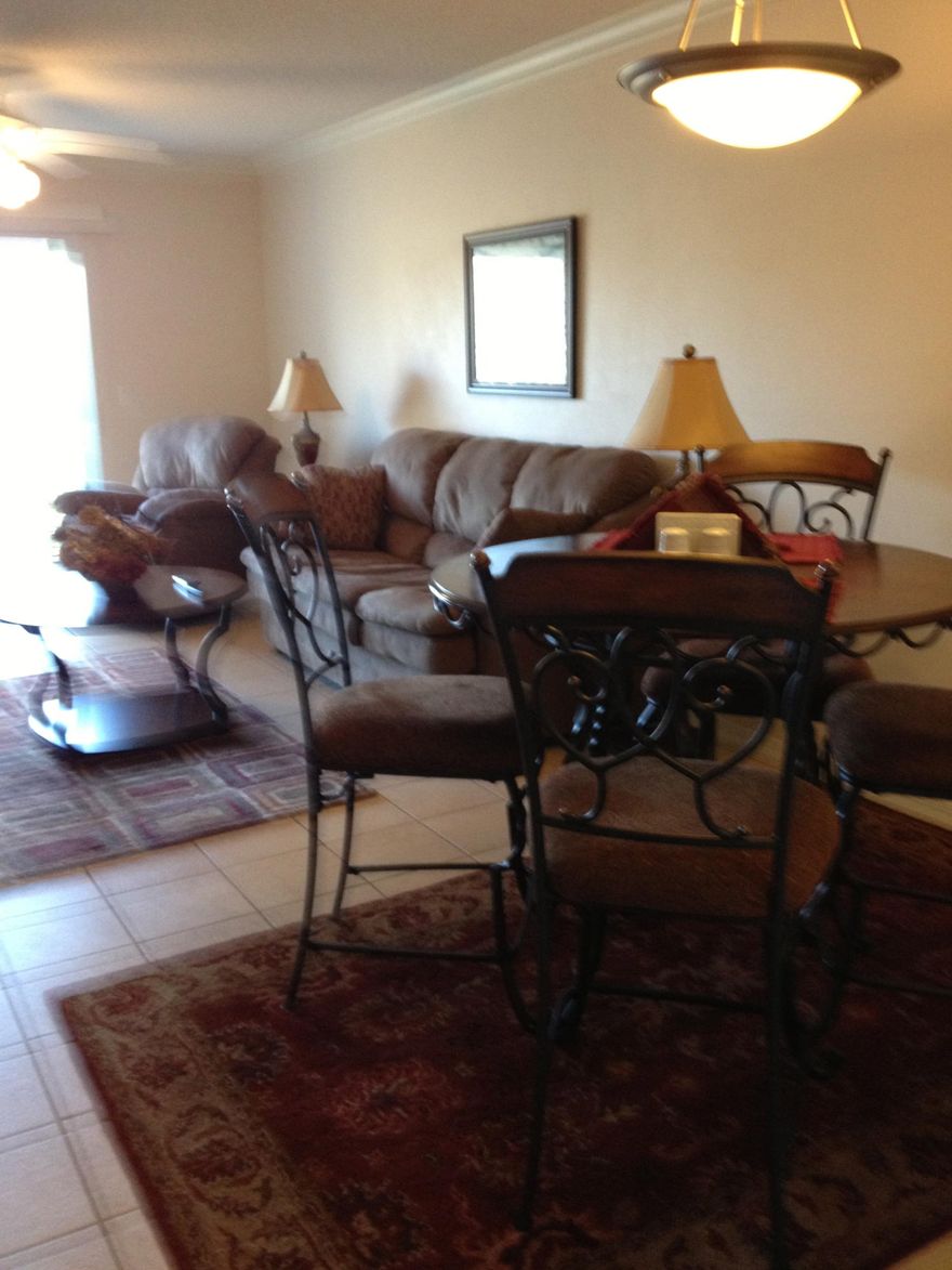 Beautifully furnished unit, see photos, with excellent rental history. This unit has a fully sized washer/dryer inside of closet. Both bedrooms have generous walk in closets. Tiled main living areas, with loop carpet in both bedrooms. Fully stocked for long term rental including cookware, sheets, towels, etc. Balcony of unit overlooks green space of the former Magnolia Plantation golf course. Balcony has exterior closet for additional storage.