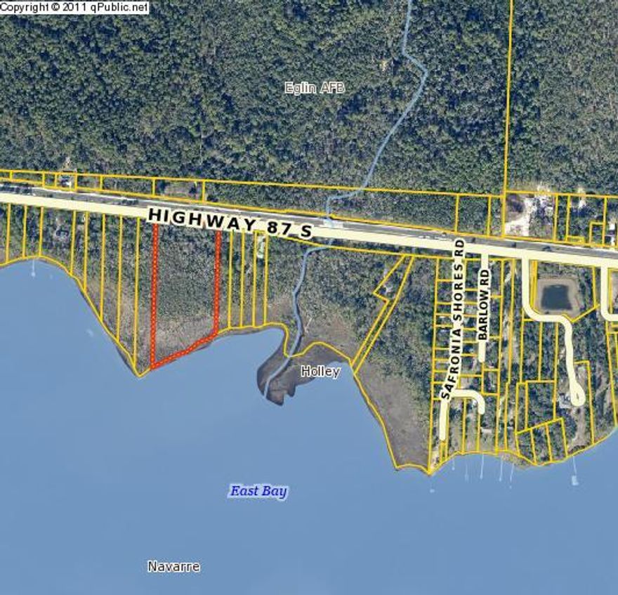 Truly an amazing piece of property. 8 acres on East bay and Hwy 87. Roughly 400 ft on the highway and 469 ft on East Bay. City Water and Utilities available out front. Currently wooded with beautiful natural hardwood and pine. The majority of the property is wetlands, but we do have a letter from an environmental scientist stating it would be possible to permit and build a single family home on the property. Huge potential here for the right person to have a one of a kind estate on the bay at an affordable price.