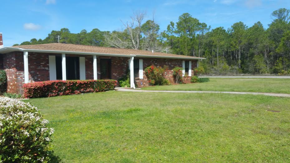 Great home conveniently located near Hurlburt Field and just a short drive to the beach and shopping. Home rewired to copper in 2011. New windows 2003. New flooring and baseboards 2014. New roof and seemless gutters 2015. Office and workshop stripped to studs in 2016. Office also had ceiling removed. Insulation was installed in ceiling and walls. Ceiling is now pressure treated plywood with treated 1x4 wood trim. Installed new sheetrock on left and right sides with pressure treated wood installed on rear wall. Interior and exterior repainted in 2015. Garage converted to an office with window a/c. DON'T WAIT...YOU'LL BE TOOO LATE!!!