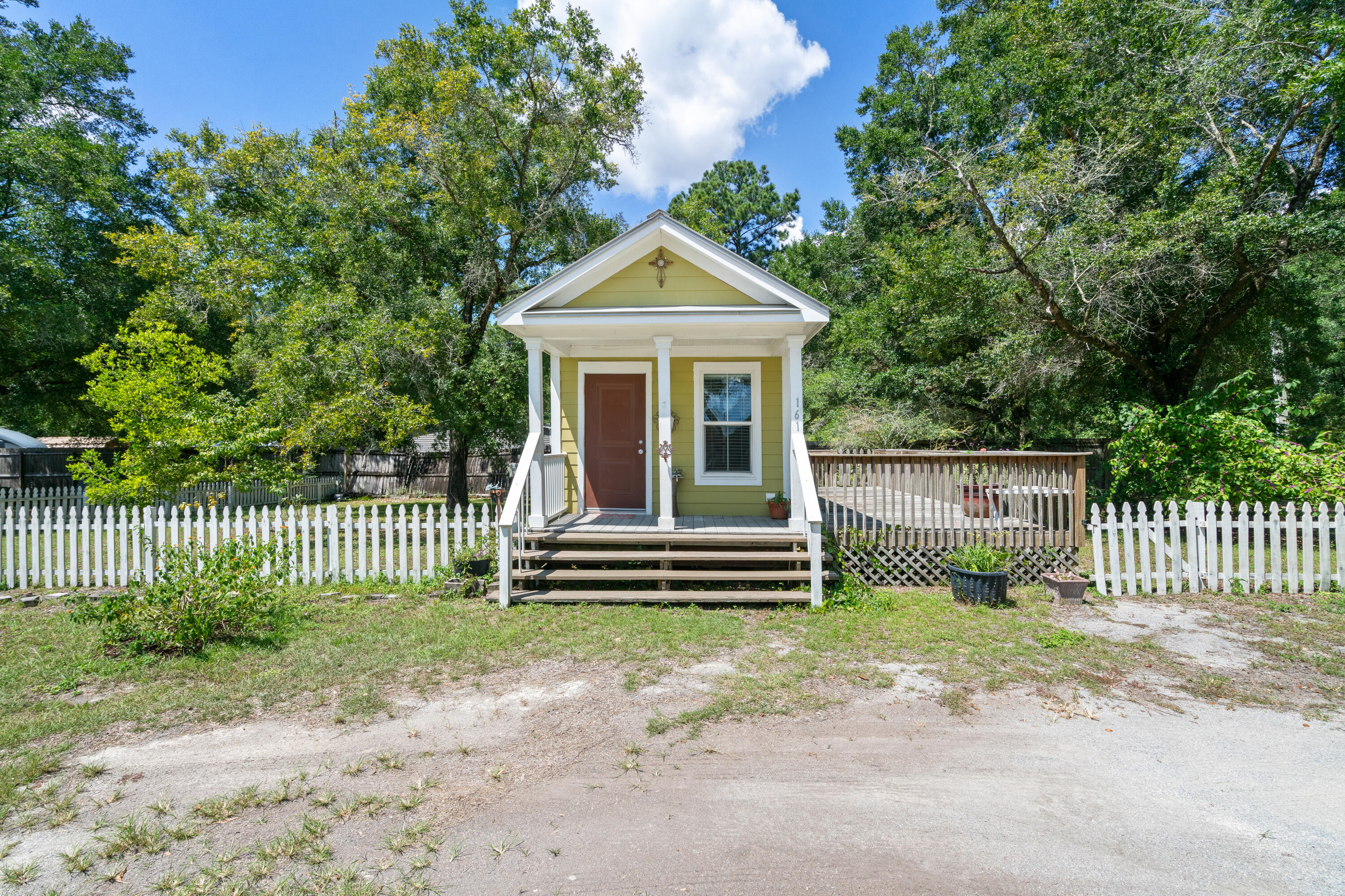 Just 15 minutes from the Emerald Coast's white sandy beaches! This 1-bedroom, 1-bathroom home is available for monthly rent and includes all utilities--making your coastal living both simple and affordable. Built with durability in mind, it features a metal roof, Hardie board siding, double-pane windows, and energy-efficient insulation. Inside, enjoy a modern kitchen with granite countertops and crown molding, plus tile or laminate flooring throughout for easy maintenance. Relax on the multiple decks and porches, and take advantage of the prime location between Destin, Panama City Beach, and Fort Walton Beach.
