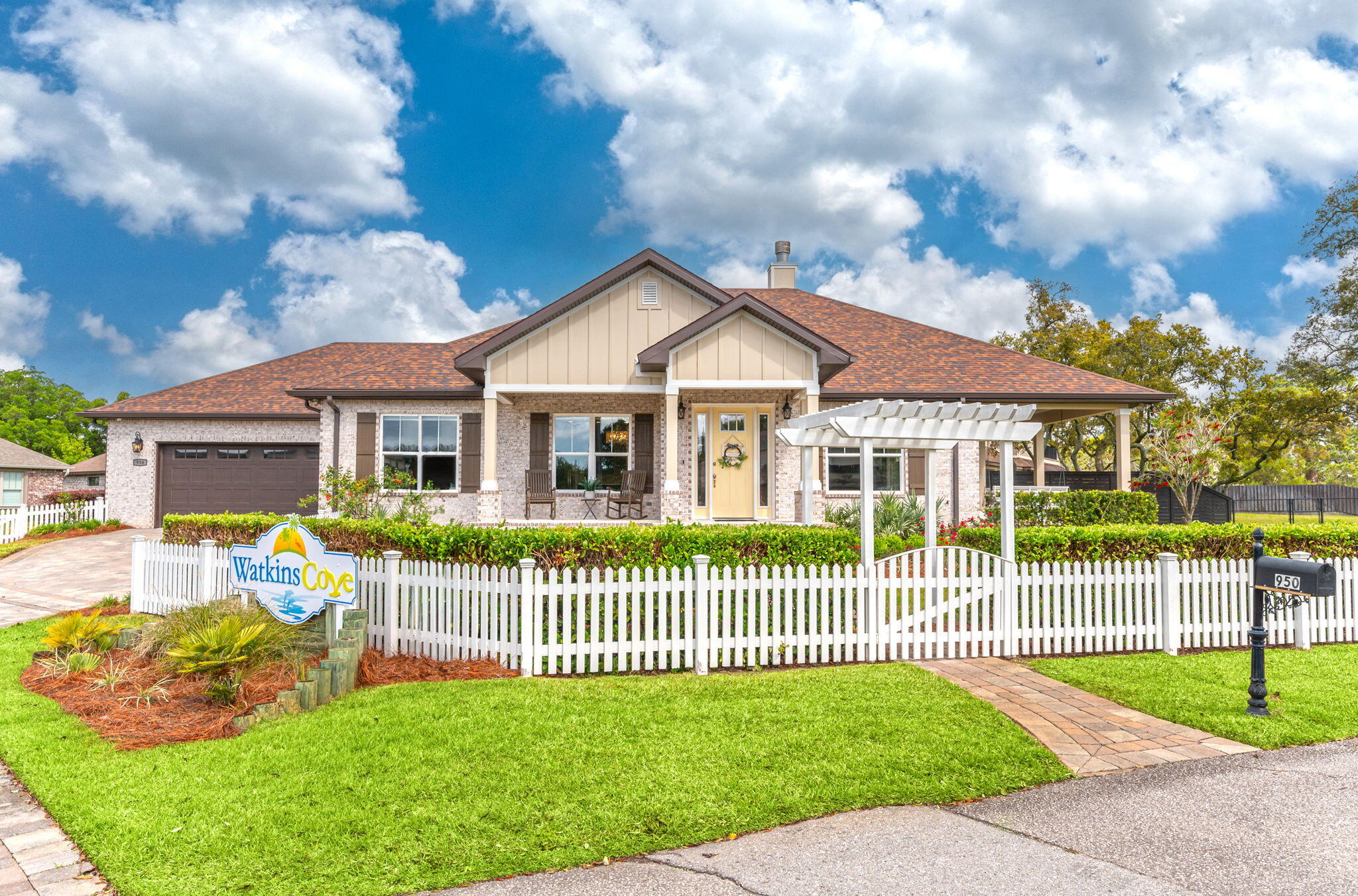 Waterfront living at its finest. Exquisite waterfront property built in 2020 by local hometown builder with boat slip on Garniers Bayou. This beautiful 3 bedroom 3 bath home has an open floor plan for large gatherings. The gourmet kitchen has custom cabinetry, 2 large islands with quartz countertops, stainless steel appliances, gas stove and coffee/wine bar. The living room has a beautiful shiplap fireplace and built in cabinetry for additional storage to displace your lovely keep stakes. The master bedroom offers incredible views of the bayou access to a large covered back porch. Spacious bathroom with large soaking tub, double granite vanities, and custom walk-in closet. If you need more closet space adjacent to the master bath there is a large covered back porch. Spacious bathroom with large soaking tub, double granite vanities, and custom walk-in closet. If you need more closet space adjacent to the master bath is a large spacious closet that you can design to meet your needs. In the master bath is an electric fireplace and wall mounted TV with shiplap on both walls in bathroom. The home offers a central vac system, Generac Generator, oversized garage is heated and cooled with a separate split system and has epoxy coated floors. The garage that is heated and cooled opens out to a beautiful courtyard for entertaining guests. Foam insulation in walls and attic. Attic has very large storage area. This home is beautifully landscaped along with a beautiful white picket fence in front yard and additional fencing all around property. So many wonderful upgrades come with this home along with custom blinds, all TVs in the home conveys with the home. Home has 2x6 exterior walls with impact windows. Make this fabulous home yours today.