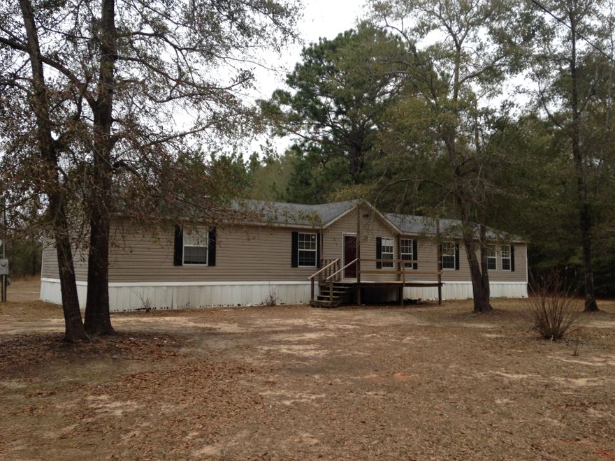 Located on over an acre this 4 bedroom, 2 bath home shines! Brand new carpet and paint throughout. Deck area in front of home. Formal living room, family room with fireplace, master suite has huge sitting area separate from bedroom as well as garden tub and separate shower.