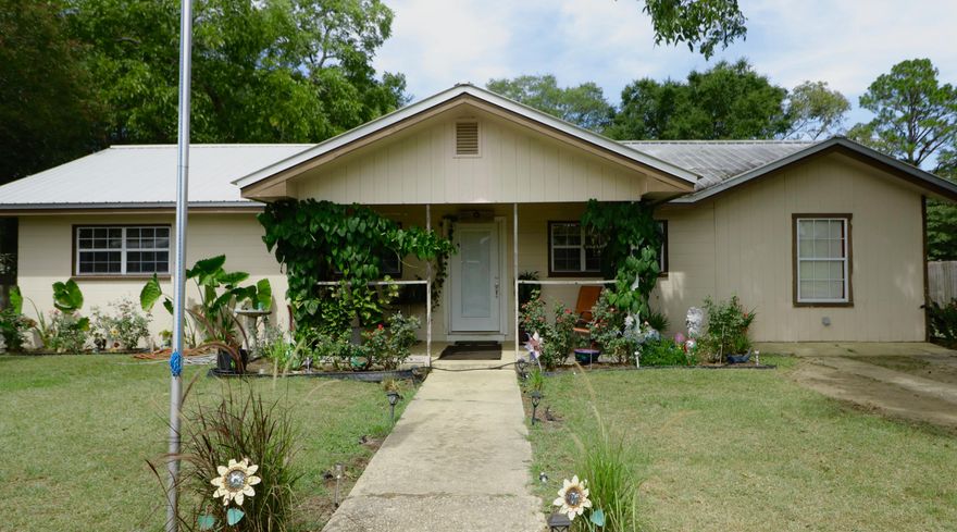 Make your appointment today to see this cute home near Paxton High School! This home has a new HVAC system in 2018 and beautiful landscaping! This home sits on a .51 acre lot with many beautiful trees which shade the lot including a pecan tree! This 3BD/2BA home has been completely rebuilt from the ground up in 1992 due to a house fire. Home features a spacious den with vaulted ceiling, rustic accent beam and a wood burning brick fire place. Kitchen has solid wood cabinets with bar top great for serving! New metal roof installed in 2010. *Note* Plumbing already in place on patio if you ever decided to expand home! Schedule a showing today! Buyer to verify measurement and all info deemed important. American Home Shield Home Warranty offered to buyer ($450 value).