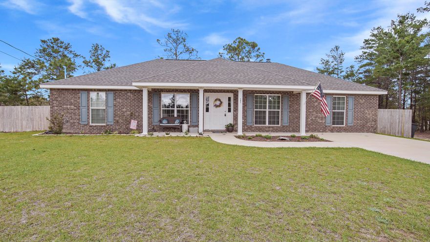 You're going to love this open floorplan in this 2 year new, all brick, 4 bed/3 full bath on nearly 1 acre! This one checks off a whole lot of boxes...home is scarcely 2 years new so it's in excellent condition. Contains 3 lots & is situated on the middle lot, leaving the 2 remaining lots to do as you wish. Build, sell, add an outbuilding - your choice!  Neutral colors with gorgeous kitchen, open to the family room & breakfast area. Dining room at entrance could also serve as office or flex space. Split floor plan with his/hers walk-in closets, double vanity & soaking tub & separate shower. On the other side 2 bedrooms share a Jack & Jill bath, while the 4th bedroom has its own private bath. Sellers say road is on paving list (and is only appx 300' from pavement). All financing accepted!