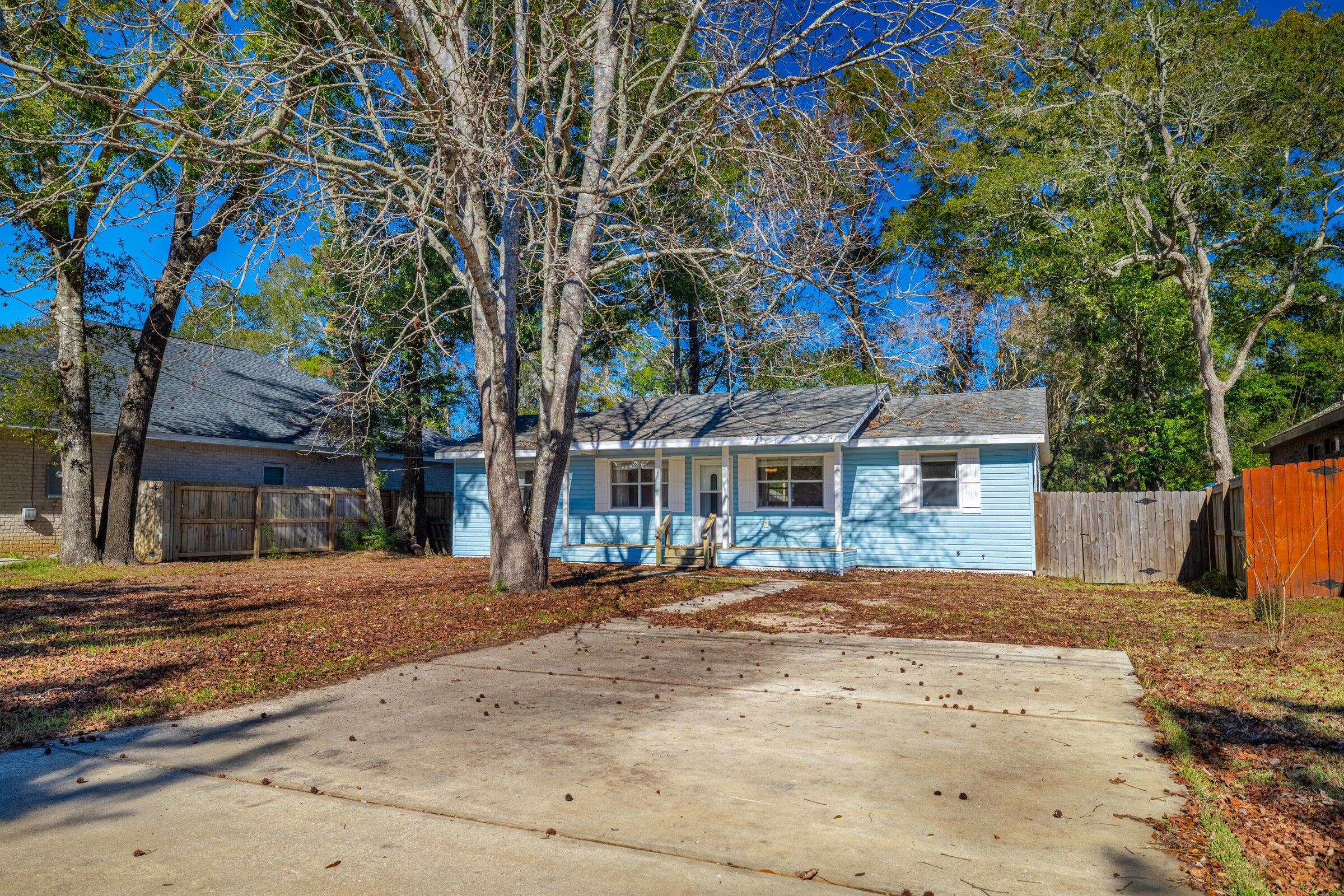 This charming 3-bedroom, 1-bathroom home located minutes from shopping, schools, and bases is perfect for a convenient lifestyle. This updated house features luxury vinyl plank flooring throughout, giving it a modern and sleek look. Step outside onto the back yard deck and enjoy the spacious and private fenced yard, perfect for outdoor entertaining or simply relaxing in the fresh air. With its convenient location and attractive amenities, this house is the perfect place to call home.