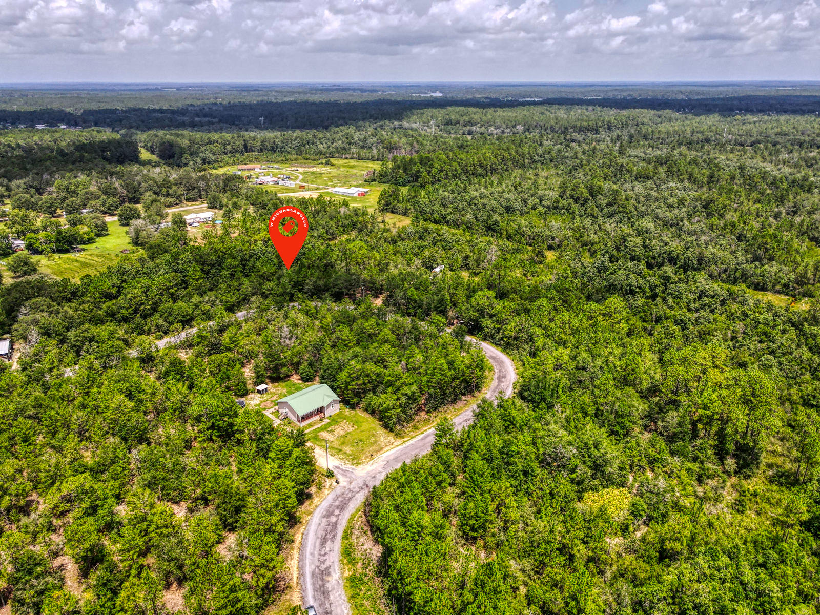 Great Investment Opportunity to build your dream home or place a mobile home on high and dry land. This property is near many great outdoor activities like fishing, golfing, national parks, and the beautiful beaches of the Emerald Coast! (Destin Florida 45 miles, 30A / Seaside 36 Miles and Panama City Beach 58 Miles).This spacious lot is located in a quiet neighborhood close to town and has quick and easy access to main highways to take you where you need to go (to have fun or go to work). Power and City water available with tap fee due. This area is zoned Rural Village, septic must be utilized.This unique property has a current boundary survey and wetland study (no wetlands present, high and dry).