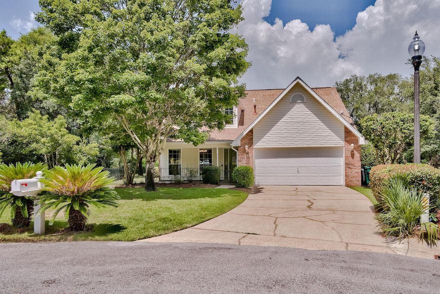 This gorgeous home with private POOL is perfectly situated on a large lot at the end of the cul-de-sac that backs up to the state park in the highly desired Parkwood Estates community of Bluewater Bay! The kitchen has been updated with silestone counter tops, stainless steel appliances, and custom backsplash. The large living room over looks the pool deck and features a fireplace. The master suite, located on the main level, includes a large walk-in closet and bathroom that has been completely remodeled with updated vanities, lights, granite counter tops, tile shower with frameless glass door and separate garden tub. Upstairs are three large bedrooms with large closets, loft area, and laundry room. The back of the home features a just repainted pool deck, perfect for entertaining and