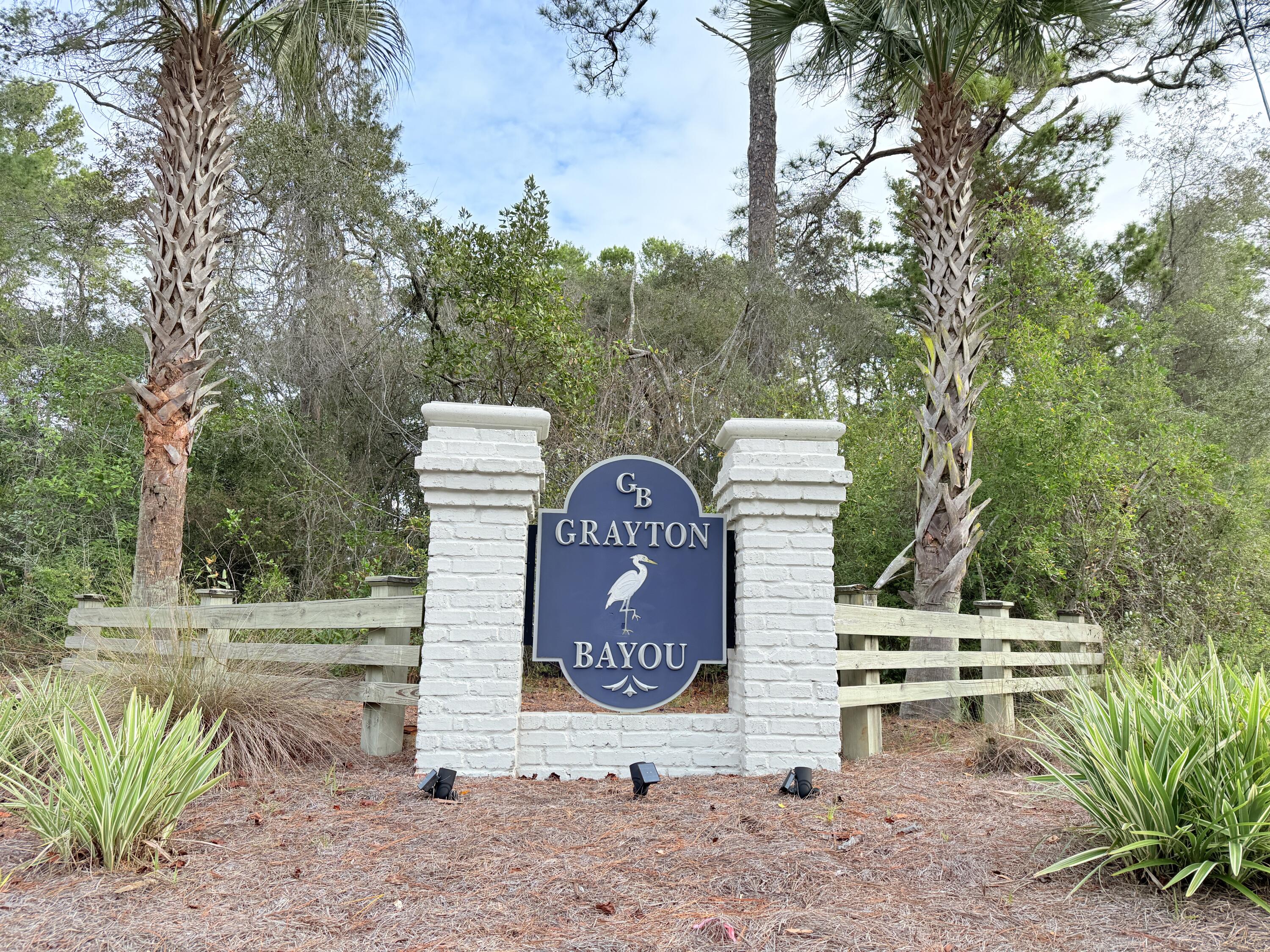 Located across the street from the Pt Washington State Forrest, this lot in Grayton Bayou is the perfect place to build your full or part-time residence. Enjoy the neighborhood swimming pool, and also close by is a Bay front kayak launch, as well as boat ramp onto McQuage Bayou and another Bay Access Park at north end of Magnolia Beach Way. HOA restrictions in place. Located about 3 miles to Grayton Beach, this is the perfect location to live the beach lifestyle with bay-side pricing. Lot features private drive at back of lot for easy access to a rear-loading garage. Located in Flood Zone X so flood insurance is not required. Underground utilities for Grayton Bayou. Oaks, Sand Pines and Palmettos cover this wooded lot. See what the Pt Washington lifestyle is all about. Builders available.