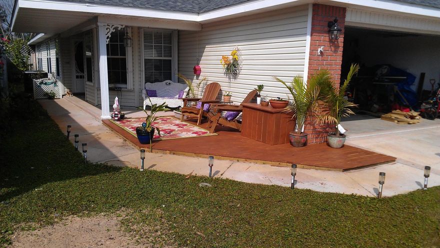 Cozy Florida Cottage nestled in the quite waterfront community of Lighthouse Pointe. This three bedroom two bath split floor plan home is move in ready. Master suite includes double vanity, walk in closet and garden tub. Kitchen includes island with double sink, smooth range top new hood vent, built in china cabinet and room for a table in the bay window nook overlooking front and side yard. The back yard is a gardener's paradise and ready for you to entertain your family and friends. The covered patio leads to a hot tub and pool surrounded by a large deck. The subdivision has several playground areas, sidewalks, and deeded access to the Santa Rosa Sound with community boat dock/pier, grilling area, and gazebo with picnic tables. Call for your tour today.