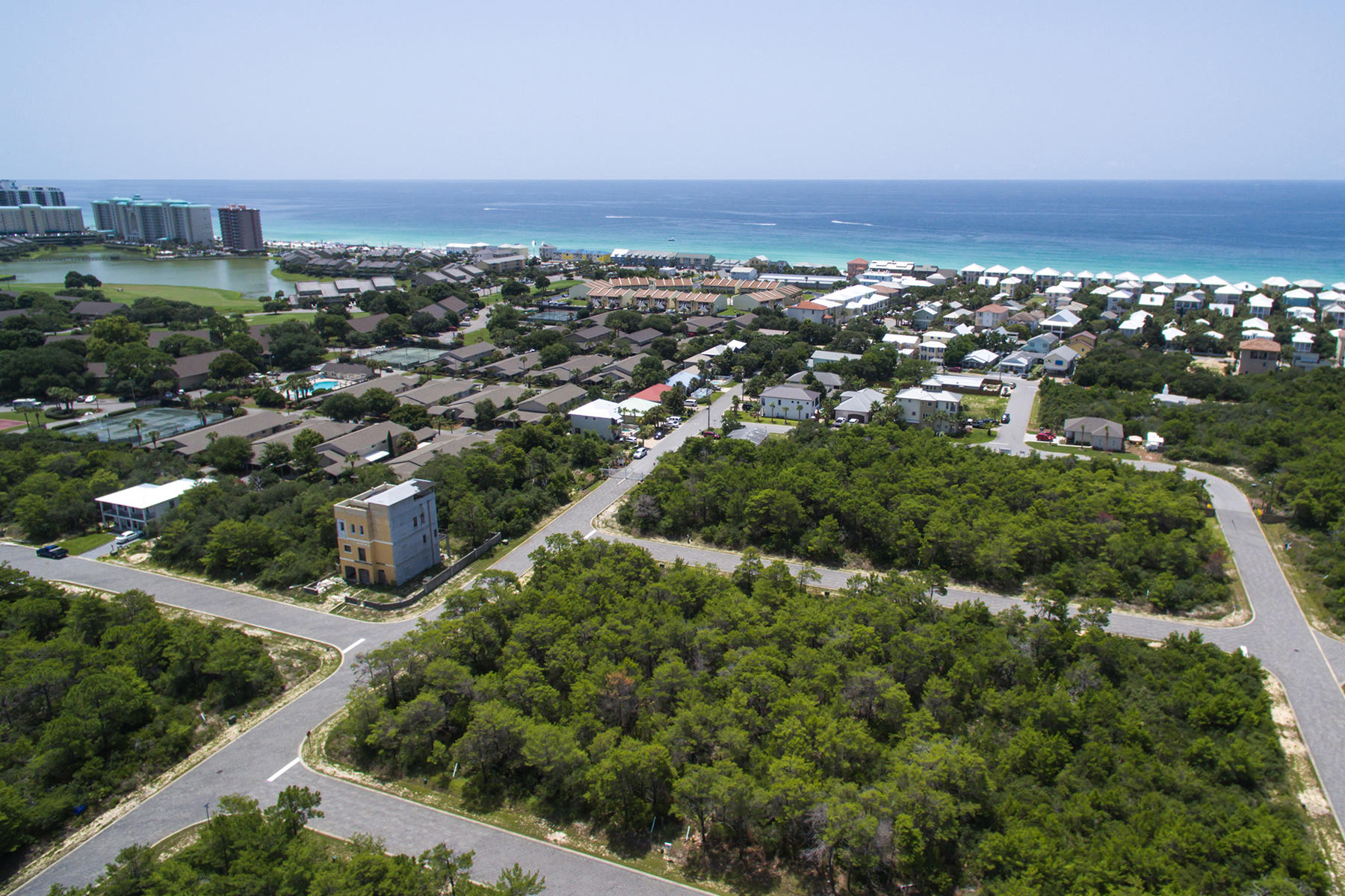 Located five short neighborhood blocks north of Scenic Highway 98 is this Villas of Frangista Beach lot. Frangista Beach his home to the historic St. Nikolas by the Sea Chapel, built in 1959 by the first resident of Frangista Beach who named the community after his native town in Greece. Beach access and Whale's Tail gulf front restaurant are just over half a mile away, as is golf at Seascape Resort. Highway 98 is approximately one mile away, leading west to nearby shopping, dining, and entertainment at Destin Commons, and east to designer outlet shopping at Silver Sands Premium Outlets and additional golf at Sandestin Golf and Beach Resort.