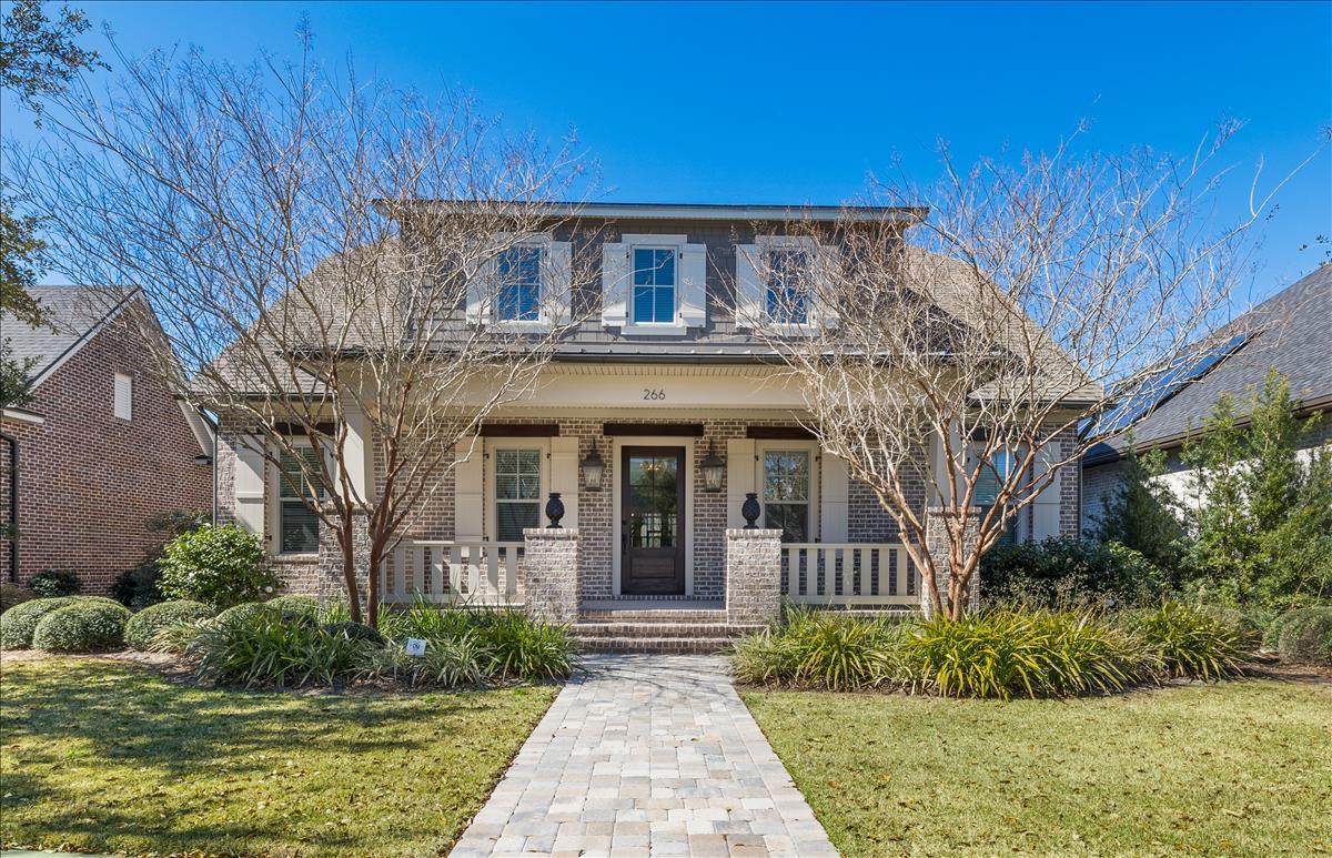 Home is under contract with a Kick Out Clause and is accepting back up offers. Welcome to 266 Champion Court in Kelly Plantation! This amazingly built Craftsman Style home is located within a 3 minute walk to the playground, tennis courts, and pool in Kelly Plantation. This home was built with luxury and family in mind. Walking up the front steps you will notice a large front porch, perfect for a swing or rocking chairs. Once inside the home you will love the wood floors, wooden ceiling beams, 10ft ceilings, interior brick walls, and so much more that make this home unique! There are 5 true bedrooms with each bedroom boasting it's own bathroom. Every bedroom also has oversized closets! There is a large bedroom/addition living space upstairs with it's own mini kitchen and top of the line