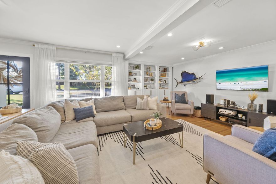 CURRENTLY UNDER CONTRACT, SELLER ACCEPTING BACK UP OFFERS. Finally - a Cove home that HAS IT ALL! 9' ceilings in the primary suite with TWO walk-in closets, a walk-in butlers pantry and wet bar, oversized living room, 3 FULL baths. Literally, everything! Step into the charm of The Cove--where tree-lined streets, covered porches, and coastal living blend seamlessly with character and charm. Thoughtfully renovated, this 4-bedroom, 3-full bath home at 2,174 square feet captures every box on your list and then some. Beautifully reimagined, this open-concept living space showcases the original oak hardwood floors, abundant natural light, and new lighting throughout. Custom built-ins and an expanded living area create the perfect setting for entertaining, while the open flow between the kitchen, living, and dining areas offers a seamless, inviting atmosphere. The kitchen is a showpiece with new custom cabinetry, quartz countertops, stainless appliances, modern backsplash, and a butler's pantry that only DREAMS are made of! This walk-in butler's pantry features floor to ceiling cabinetry and doubles as your dream entertaining station just off the covered back porchcomplete with wet bar, drink fridge, and coffee bar!

One of the best features of this home is the primary suite! Boasting 9' ceilings (a rare find in the Cove!), this suite a is a true retreat, offering TWO full size walk-in closets, new carpet in the bedroom, French doors to the covered patio, a large-modern soaking tub, walk-in tiled shower with seamless glass doors, modern fluted double vanities, fluted linen tower, and brushed gold lighting. 

Every detail was considered for modern function and refined style of this retreat and with its split floor plan - this space has everything that other Cove homes do not! 

This home features 3 FULL baths which is a rare find in the Cove. Convenient for guests or for families that don't want to share, you'll love this feature! With 3 guest bedrooms and 2 guest baths, this is a great layout with large closets and renovated baths. The layout was reimagined with a large covered porch off the Butler's pantry area and a back yard with a privacy fenced and a sliding gate for easy access to the alley. This back yard offers 50-amp power and sewer cleanout, great for RV hookup and a slab for a shed or garage with electrical already to it. The driveway is extended with pavers for easy storage for a golf cart or bikes and plenty of parking. 

This home offers updated plumbing (and updated sewer line to the road), updated electrical, November 2018 roof, new doors and windows, irrigation, sod and so much more. 

This home blends history and heart with the modern updates in the Cove. With it's proximity to Downtown Panama City, this is one of the area's most beloved neighborhoods. Walk or golf cart to parks, the marina, and downtown restaurants...because life in The Cove is meant to be enjoyed.