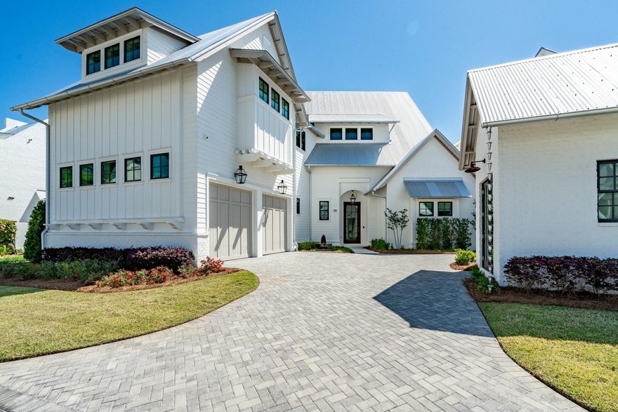 Attention boaters, a 35' deep-water boat slip with installed lift is available with this home! Nestled within the sought-after Churchill Oaks community, this beautiful 4br, 4.5 bath home offers lake views from almost every room. This classic, yet contemporary home includes high-end finishes and features with wire-brushed white oak hardwood floors, designer lighting fixtures, Chicago brick interior, and crown molding throughout. The space is perfect for entertaining inside and out, with an open-concept kitchen/dining/living area + wet bar, and 2 private courtyards with summer kitchen, pool, and fire pit. The chef's kitchen includes custom shaker style cabinetry, quartz counter tops, with upgraded SubZero and Wolf appliances. All 4 large bedrooms feature en-suite baths plus balconies overlooking the lake. The luxurious ground-floor master suite pampers, with a sitting/reading area overlooking the private lake-front courtyard outdoors. Nothing is overlooked, including a 2-car garage, and a detached office. 

Tucked away amongst native vegetation and the calm waters of Hogtown Bayou, Churchill Oaks offers a lifestyle of elegance and appreciation of nature. Once inside the stately gated entrance, magnificent coastal homes accentuate southern architecture under a canopy of old oak trees. The 40-acre community is comprised of 87 homesites and some of the best amenities in South Walton. The latest amenity to the community is a deep-water, private marina. The marina project includes 36 private boat slips, paddle board storage decks, a fish cleaning station, shoreline stabilization + more! The Churchill Oaks Clubhouse is an outstanding 8,000 square foot amenity situated on a point on the Bay with stunning views. Three pools, exercise room, outdoor bar, fully equipped media room, commercial grade kitchen, bath and locker rooms, and large gathering spaces are all found at the Clubhouse for owners and their guests to enjoy. * Please verify with listing agent the total New Buyer fees due at closing.