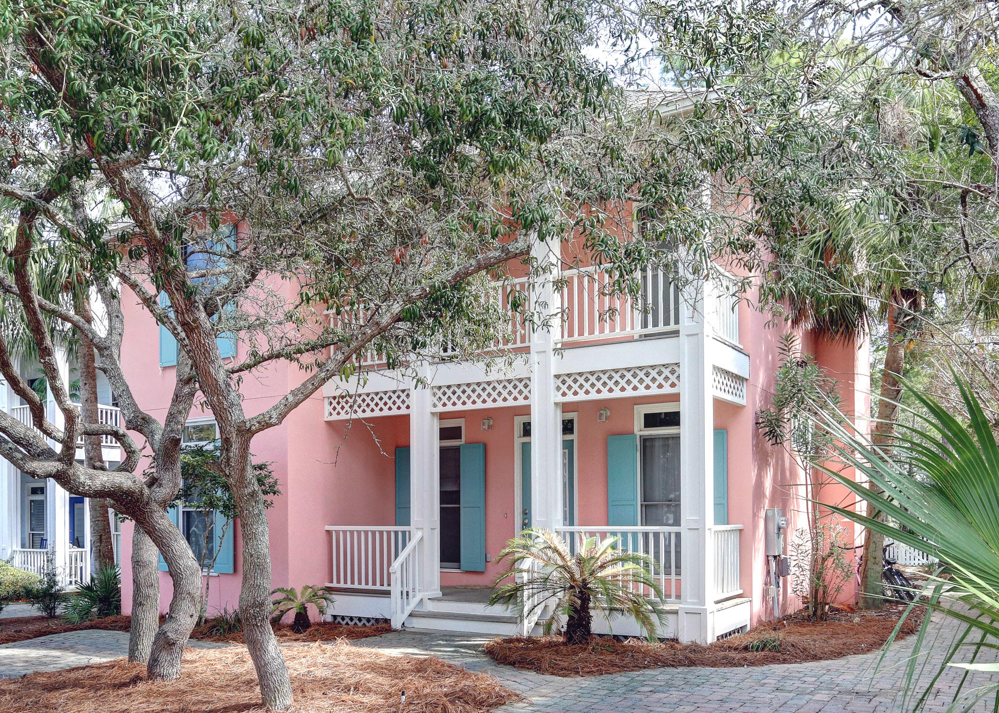 Great location! Great price! Great opportunity! Located just steps from the beach, this 4 BR, 3 BA home in desirable Cassine Village is ready for your personalization. Interior has been freshly painted with fashionable grey paint and white trim. First floor has living area, dining, kitchen, bedroom & bath with shower. Upstairs are two additional bedrooms that share a hallway bath. Large master bedroom with ensuite bath. Charming covered front porches on first & second floors and screened in porch on back allow for relaxation. The back yard accesses a path to one of the two pools. Two tennis courts, two pools, lake with picnic area, nature trails, low HOA fees and close to restaurants, shopping, biking and hiking trails.