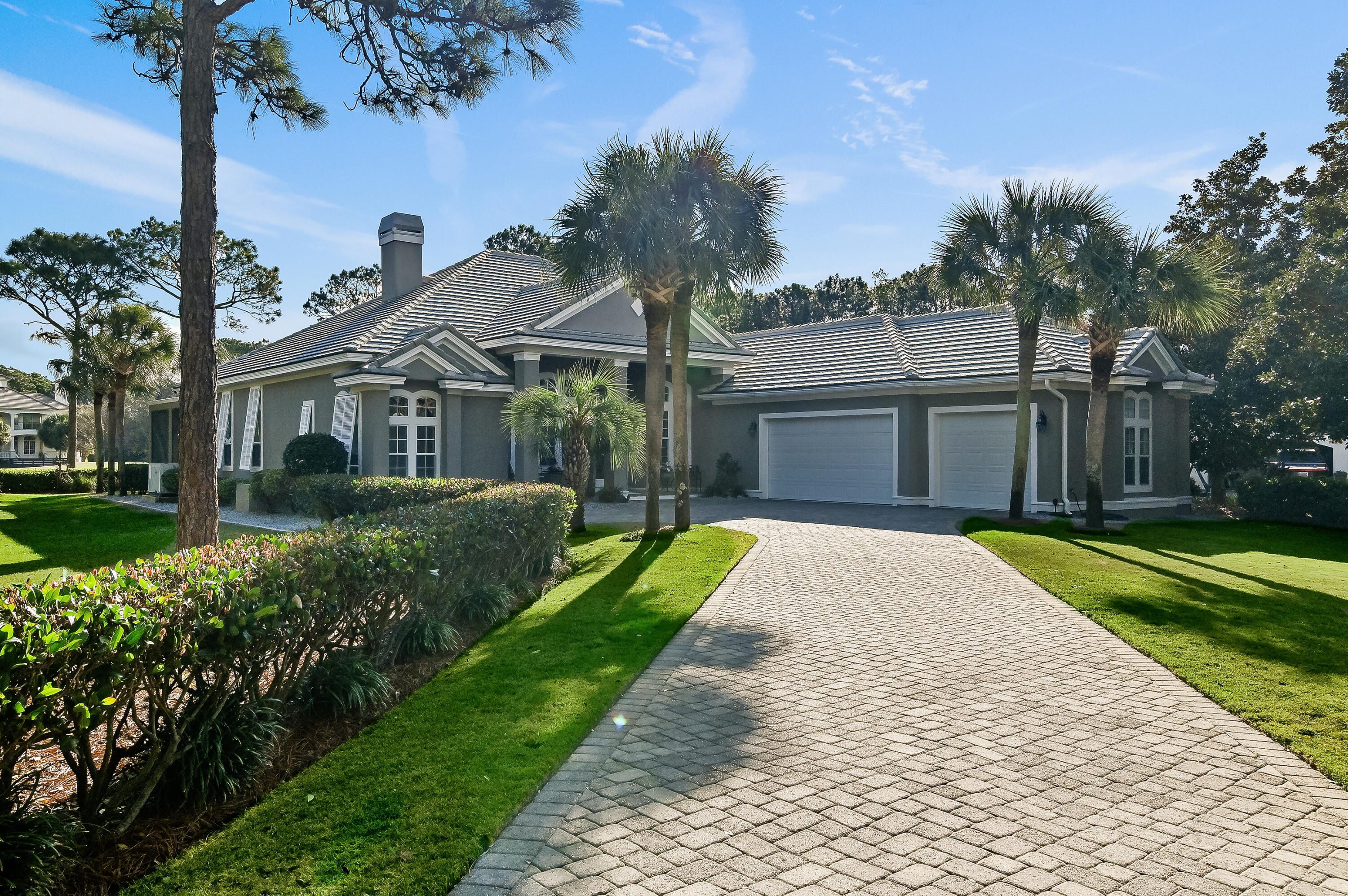 This beautiful one-story home is sure to impress and is in pristine condition. Perfectly maintained by one owner and priced below market value, this will surely sell quickly. Revel in breathtaking views of the golf course from the large screened outdoor living area and pool. Tucked away in a serene cul-de-sac, this home is ideally situated within the prestigious gated community of Regatta Bay. The spacious layout boasts three generously sized bedrooms, a dedicated study, three full bathrooms, and a gourmet kitchen equipped with all the modern conveniences, including ample storage. The dining room is expansive, while the family room features a cozy gas fireplace and built-in shelving for additional storage. Click more for additional info. The thoughtfully designed split floor plan includes a luxurious master suite that offers spectacular views of the outdoor living space, pool, and golf course, complete with private access to the outdoor area, his-and-her walk-in closets, and a cozy sitting area. The impressive master bath is enhanced by a large whirlpool tub, a spacious custom-tiled walk-in shower, and dual vanities. Furthermore, the property includes a full house generator, 3-car garage and a beautifully landscaped yard. Last but not least flood insurance is not required! This exceptional home won't be on the market for long! Schedule a showing today! Professional pics coming soon!