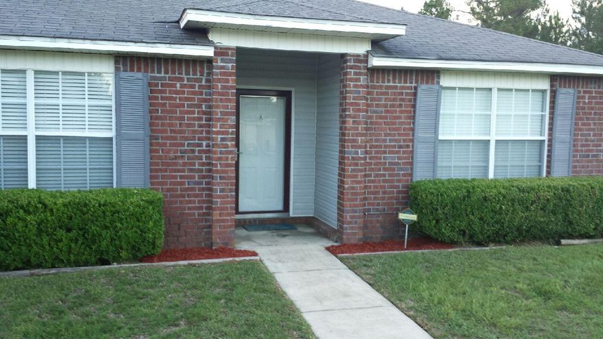 Fresh Paint!! Quiet neighborhood, South of I-10, 3/2 split bedroom, open floor plan that flows from living room to the backyard for entertaining. Kitchen is equipped with plenty of counter space, lots of cabinets and kitchen island equipped with electrical outlet for your convenience. Enjoy family dinners in the formal dining room or utilize space as functional office space. The master bathroom has a garden tub, double vanity, his & her walk-in closets! Pergo wood flooring is throughout the home and carpet in the bedroom areas. Conveniently located to military bases.