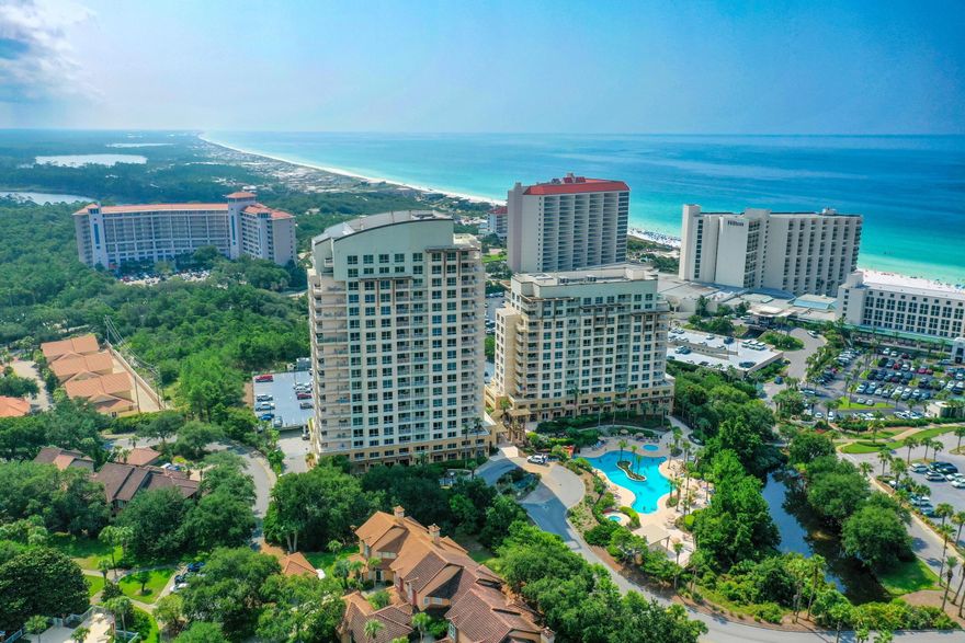 Located on the 4th floor this pristine beach retreat offers an unobstructed view of the Gulf of Mexico. This furnished renovated unit is immaculate and features a preferred floor plan with a flexible lock-off that offers a spacious 2 bedroom, 2 bath unit or maximize your rental potential as a well-appointed 1 bedroom condo with a separate studio. Each can be rented separately. This unit offers new furnishings and decor, custom window treatments, beautiful updated bathroom, laundry closet, and a large wrap around private balcony for you enjoyment. This rare condo has it all and you are steps away from the beach! A separate owner's storage is on garage level. Luau offers a stunning lagoon-style pool with a hot tub, waterfall, seasonal tiki bar fitness center and garage parking.