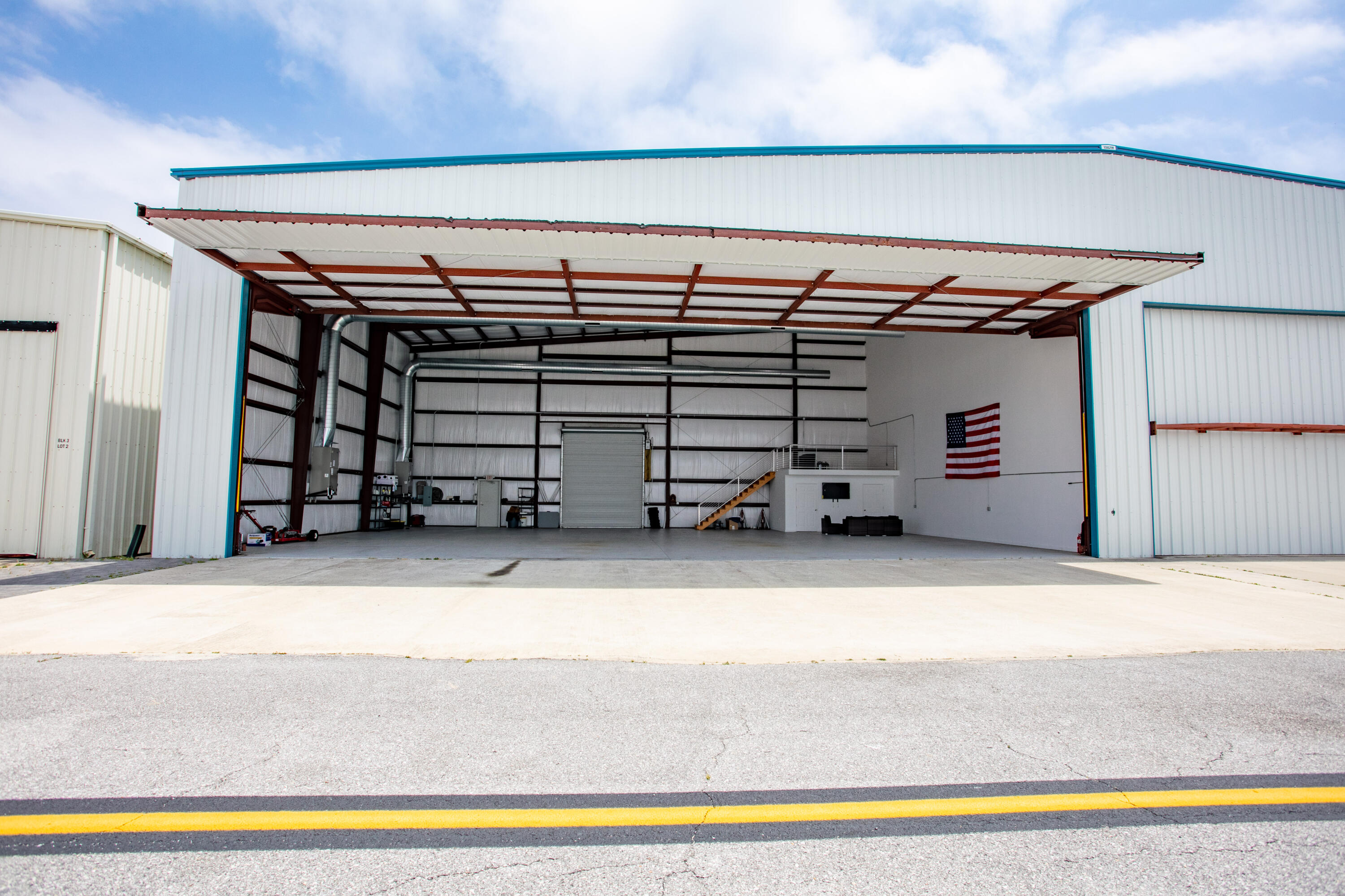 The Destin Executive Airport (DTS), located in the heart of Destin, Florida, rarely offers private leaseholder interest in hangar opportunities. We are now offering one of the finest hangars that will accommodate quite an array of aircraft. The conditioned space offers a large automatic roll-up door for rear access of vehicles, with an enormous automatic bifold door, both of which contain sensors to shut off both air conditioner units once either door is automatically opened. The current lease term matures in 2037, with a (20)-year option to renew thereafter, which length of term and option to extend has become quite a rarity in and of itself at this private airport.
