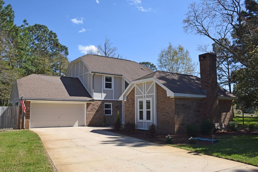 Bring your golf clubs, your tennis racquet, & your boat! You can just enjoy all the Bluewater and Gulf Coast amenities because there is nothing you will need to do to improve this lovely, livable family home! You'll find nothing but high quality, eye-appealing updates throughout! (The list of updates and improvements at the end of this listing information.)Welcome your family and friends into the uniquely beautiful glassed-in foyer featuring a ''bride's staircase'' and smooth travertine floors.The gracious living room provides plenty of space for large furniture, bookcases, and art. The high angled ceiling, Brazilian cherry floors, and the travertine fireplace surround make the room feel both luxurious and comfortable-- perfect for both everyday and guests, too.