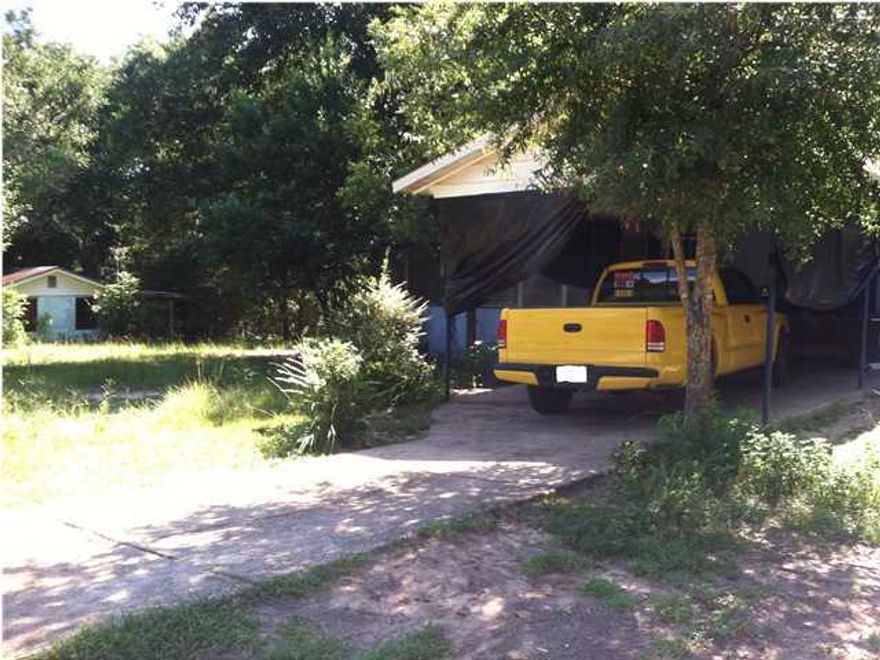 Fantastic investment opportunity in the heart of Crestview! Over half an acre lot, 3 bedroom home with so much potential!! Home features an open living room, separate laundry room, a cozy kitchen, and 3 generous sized bedrooms. There is a covered parking feature and plenty of room for guest parking in the driveway. This home sits at the end of a dead end road so less noisy traffic! Close to shopping centers, medical facilities, and parks! There is another building on this lot but is given no value. Buyer to verify all pertinent information.