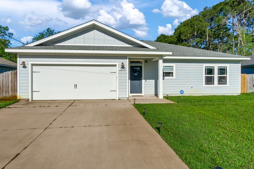 AVAILABLE IN JUNE! Gorgeous 3 bed/2 bath solar panel home in East Navarre! Open split floor plan. The bright kitchen features stainless appliances, white shaker cabinets, and quartz countertops. Plank wood-look tile in living areas and carpet in the bedrooms. The large primary bedroom has trayed ceilings and an ensuite bathroom with a walk-in closet. There are two additional guest bedrooms and a guest bathroom. Make plans to enjoy the covered patio and fenced backyard year-round. Extras include AS IS security system, fabric hurricane shutters, and irrigation. Easy commute to Hurlburt Field and Navarre Beach for work or play! Pets allowed upon approval with a non-refundable pet fee and with a Petscreening.com report.