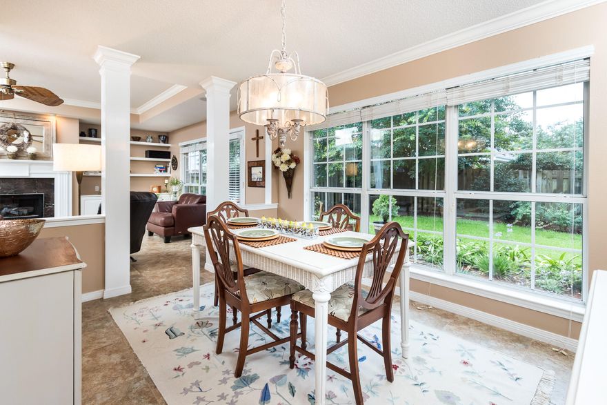 Motivated Seller All Offers will be Considered!! Roof installed 12/20/13 new hot water heater 11/2018. Beautiful, Well Maintained, Move in Ready home. Beautifully Landscaped. Lots of windows overlooking your nicely landscaped fence backyard with porch to listen to your surround sound to share with family and friends. Living Room and Master Bedroom also have surround sound.Lots of shelving & Crown Molding ,You will also notice the beautiful custom lighting & fans throughout the home. All areas of the home is beautifully tiled and carpet in all bedrooms. Kitchen is equipped with ALL Updated Stainless Steel Appliances & also has nice size pantry with laundry room Kitchen has breakfast nook beside