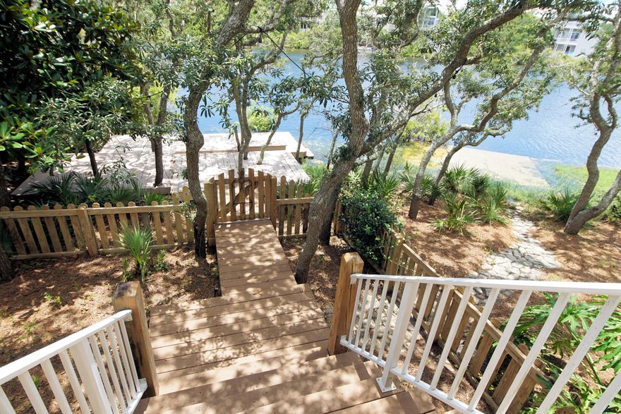 Beautiful 5BR/5BA lakefront home plus additional guest home in the seaside gated community of Destiny. Upon entrance, you are greeted with open concept  floorplan with captivating views of the backyard & picturesque lake.  The home is well designed with 2 bedroom suites with full baths located down stairs.On the 2nd floor is the master retreat, ensuite bath, jetted tub & dual vanities. Master has a private balcony to enjoy gorgeous lake views & coastal breezes. An additional bedroom & full bath is located on the second floor distanced from the master for privacy. Laundry is located off the kitchen and leads to the covered walk way to the garage. One of the best features of the home is the separate guest house above the garage. Your company will love having a privacy & space with a view.