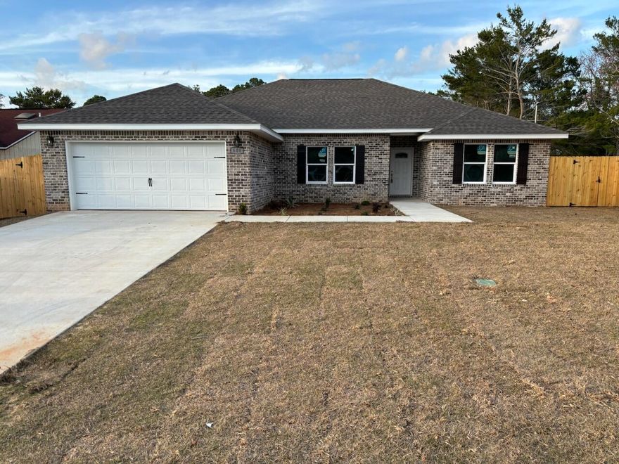 STAR QUALITY, CUSTOM BUILT, ALL BRICK, 4 BEDROOM, 2 BATH HOME, AN ARRAY OF SPECIAL FEATURES! 75' FLAT SCREEN TV, 70' ELECTRIC FIREPLACE, CUSTOM RECESSED NOOKS, LIVING/GREAT ROOM, DINING AREA, NINE AND TEN FOOT CEILINGS W/CROWN MOLDING. LIVING/GREAT ROOM AND MAIN BR HAVE TRAY CEILINGS ACCENTED WITH RECESSED LIGHTING. NICE SIZED BEDROOMS. CEILING FANS IN ADDITIONAL ROOMS! FULLY LOADED GALLEY KITCHEN EQUIPPED W/UPGRADED STAINLESS STEEL KITCHEN APPLIANCE PACKAGE. CUSTOM BUILT WHITE CABINETS, GRANITE COUNTERTOPS, LVP FLOORING THRU-OUT, WALL PAINT COLOR - REPOSE GRAY,  EPOXY FLOORING IN GARAGE. PHOTOS ARE FOR SAMPLE PURPOSES ONLY.  $1600 Lender Credit if you choose to use our preferred lender.