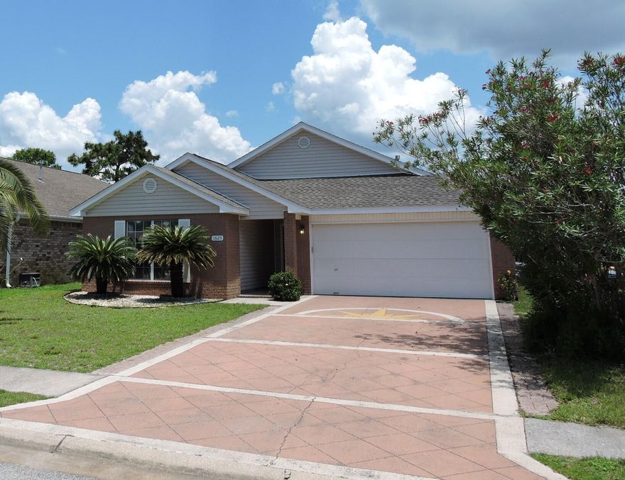 Fantastic home just outside of the EAST gate of Hurlburt in Emerald Village with sidewalks and underground utilities! Open floor plan with 4 bedrooms (all new carpet) and 2 baths.  Living room has a fireplace, high ceilings, and beautiful tile flooring.  Kitchen has white kitchen cabinets (recently refinished), corner walk-in pantry, and pretty counters.  Primary bedroom suite is a very nice size, has a large walk-in closet and double vanities in the bath.  The other 3 bedrooms are a good size and the second bath also has double vanities.  Fenced back yard. 2020 roof, 2013 water heater, 2018 HVAC system, home siding is brick, vinyl and cement board (low maint). Brand new carpet in all bedrooms.  Freshly painted in 2022.  This home is truly move in ready!