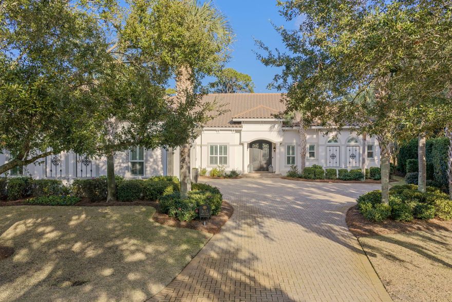 An entertainer's dream set along the 16th fairway of the Raven Golf Course, this beautifully updated residence is nestled within the quiet, non-rental enclave of Island Green. Thoughtfully refreshed with fresh interior paint, new drapery, and designer lighting--including chandeliers and sconces throughout--the home blends timeless elegance with modern comfort.The heart of the home features an updated kitchen with new cabinet hardware, a brand-new refrigerator, walk-in pantry, and effortless flow into expansive living spaces complete with a wet bar and five-panel seamless windows. An accordion door opens to the screened-in lanai, creating a true indoor-outdoor living experience.Outdoors, enjoy a private resort-style oasis with a heated saltwater pool, waterfall hot tub, outdoor  kitchen, and gas fireplaceideal for year-round entertaining while overlooking the golf course. A newly installed backyard fence enhances privacy and functionality.

The main-level primary suite offers a luxurious retreat with his-and-hers closets and vanities, a double-access shower, tranquil views, and direct access to the screened lanai. A private study with built-in wood cabinetry, hardwood flooring, and a fireplace provides an elegant workspace or reading room.

Upstairs, new carpet complements two additional bedrooms, a kitchenette, media room, and balconyperfect for guests or extended stays. Storage is abundant throughout the home, and an oversized three-car garage adds exceptional convenience.

As part of the Sandestin Resort, owners enjoy unparalleled access just minutes away to pristine white-sand beaches, the marina, Baytowne Wharf, Grand Boulevard's premier shopping and dining, world-class golf and tennis, and the resort's aquatic center. Luxury updates, generous living spaces, and an unbeatable golf course setting make this home a rare opportunity in Island Green.