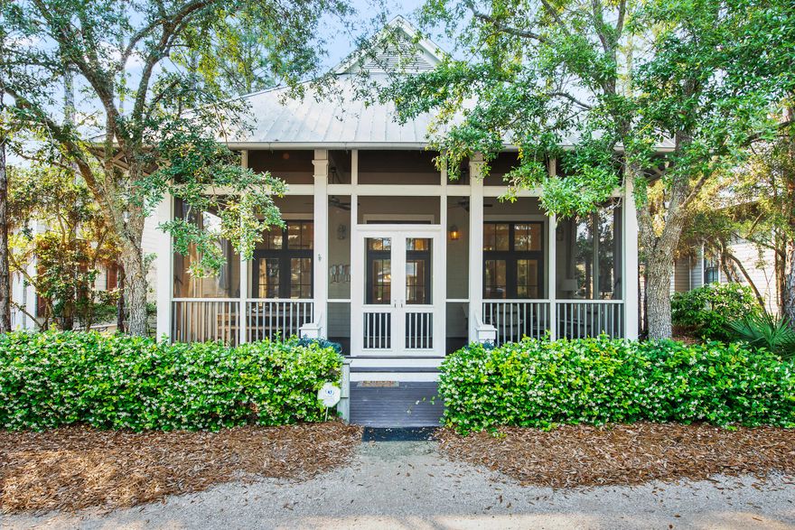 Impeccable Watercolor Camp District Home Designed by noted architect Matt Savoie and built by Romair Construction in a prime location just steps from Camp Watercolor. Strong rental history sleeping 10 with ample covered parking and includes a 2018 6 Seater GEM Car! Home was recently updated by Lovelace Interiors and has a spacious open floor plan with stunning 22-foot tongue and groove wood paneled cathedral ceiling in the main living area, clean coastal white walls and beautiful hardwood floors throughout. The gourmet kitchen boasts new quartz countertops, Sub Zero fridge, Wolf gas range and a wine cooler. First floor master bedroom has access to a side screened in porch, large bathroom with standing shower and whirlpool tub. There are 3 additional bedrooms on the second