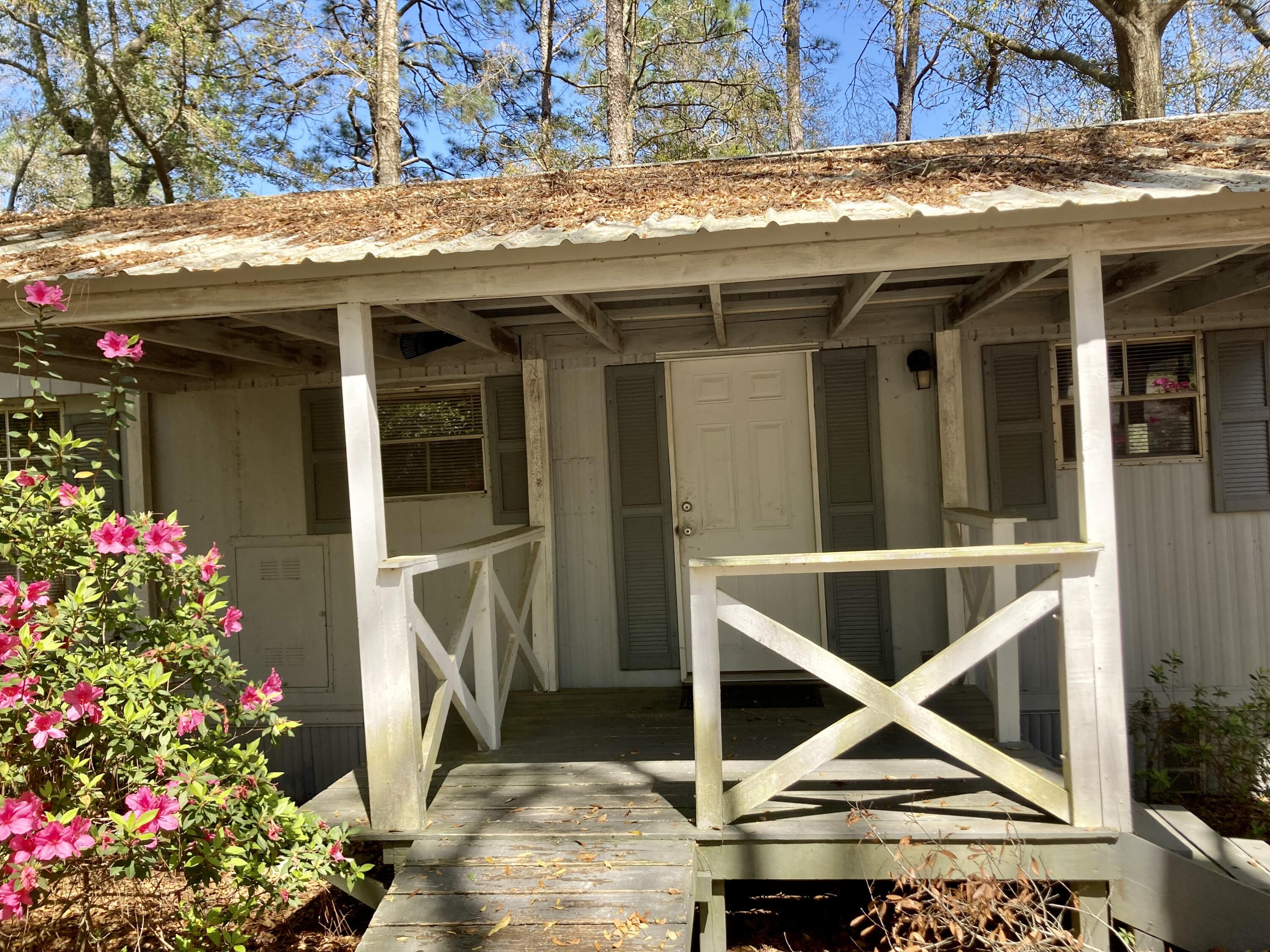 This 2BR/2B home sits on the desirable King Lake in DeFuniak Springs. It is nestled on a dead end street with no through traffic. It has a very nice workshop with electricity and a boat dock that is functioning but needs a little TLC. The mobile home had s newer Metal roof but is being sold As-Is. The large waterfront lot has endless possibilities. Please schedule your appointment to view this property today.