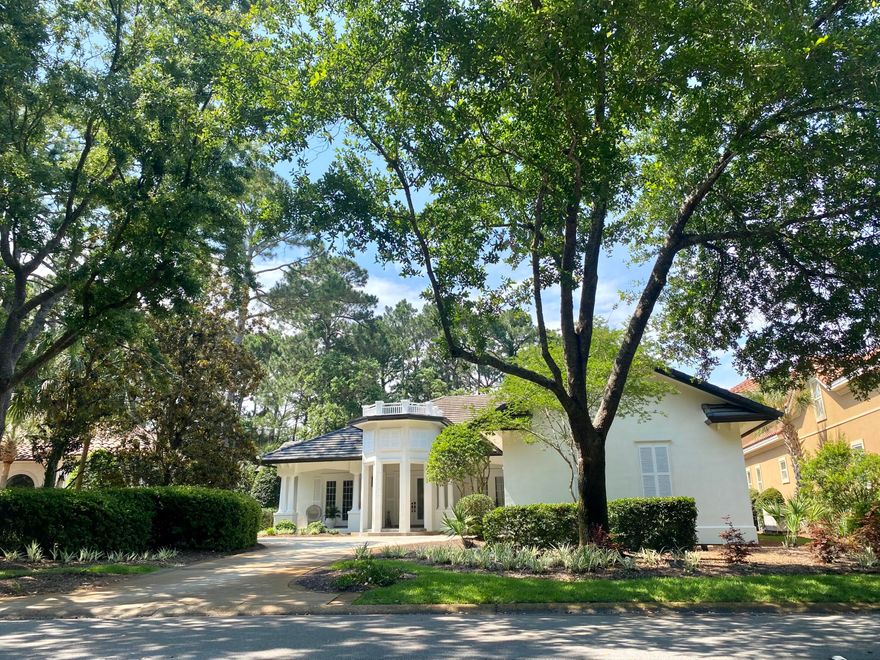 Nestled on a quiet cul-de-sac in Burnt Pine, this grand single-story residence boasts 12 foot ceilings, hardwood floors and stunning architectural doors and windows. A gas fireplace provides a cozy focal point for the living room which overlooks the peaceful lush lanai and fenced-in pool area. The heart of this home is undoubtedly the French chef's kitchen, meticulously designed with beautiful thick beveled marble countertops. A large butler's pantry with coffee station, built in refrigerator and wine cooler are just a few of its other numerous features. The spacious master suite contains his and her walk in closets. Wall to wall marble adorns the bath which also features a copper tub and massive shower with multiple shower heads. Too many features to list, schedule a showing today!