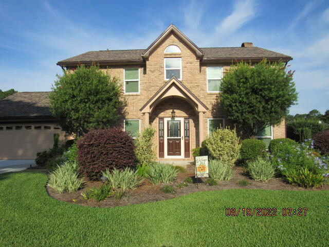 Beautiful brick 4 bedroom, 2 and 1/2 bathroom home in Overbrook with two car garage and newly covered enclosure over the in-ground pool! Pool/spa can be heated as it has a new gas heater. Roof , windows and water heater replaced in 2020. Both HVAC units have been replaced. One in 2019 and the other in 2021. The driveway was replaced in 2022. This is move in ready! Large gourmet kitchen with breakfast bar and comfy eat-in area. Formal living room and dining room and nice den with gas fireplace and built-in bookcases. All bedrooms are upstairs. Screened Florida room overlooking the covered pool and beautifully landscaped yard. Privacy fenced back yard with in ground covered pool with lawn pump and sprinkler system on well. All information is believed to be correct but should be verified. New windows are hurricane/impact rated to 200 mph and door blankets and an accordion shutter is available for the sun room door.