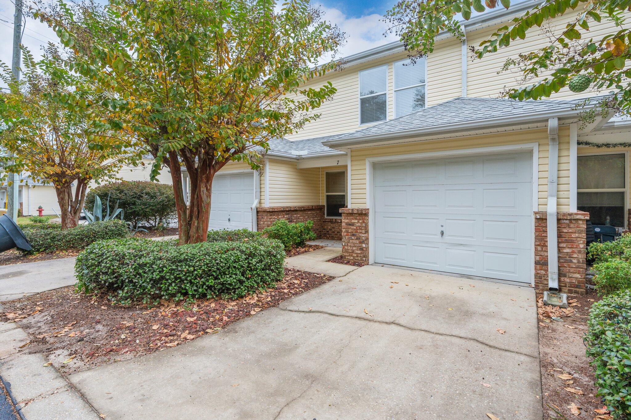 CONVENIENT LOCATION! GARAGE! New Roof and NEW HVAC in 2024! This 2 story 2 bed 2.5 bath Condo is centrally located in FWB, MOVE IN READY  and affordably priced! The unit is well maintained and includes upgrades such as Tile flooring downstairs and  NEW LVP flooring upstairs, new garbage disposal, new microwave, and fresh paint throughout. Lawn care is included in the HOA making this property truly low maintenance! There is a large kitchen with breakfast bar, a patio out back ,and an upstairs laundry room. If you are looking for a spacious property with a lot to offer in Ft Walton Beach, be sure to put this one on the top of your list.