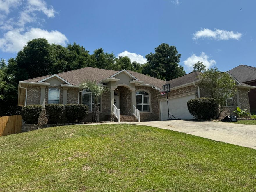 ***Move-in Special - $500.00 for first month's rent***Make a grand entrance into your new home, perfectly situated on a large, landscaped corner lot in the prestigious Fox Valley of Crestview. Boasting 4 bedrooms & 3 baths, this residence radiates elegance from the moment you step through the front door.High ceilings adorned with crown molding create an airy ambiance, while trey ceilings in the massive living room add a touch of sophistication. The sitting room & dining room are adorned with large arched windows, flooding the space with natural light & accentuating the interior details such as bullnose cornered walls.This home exudes modern charm & warmth.