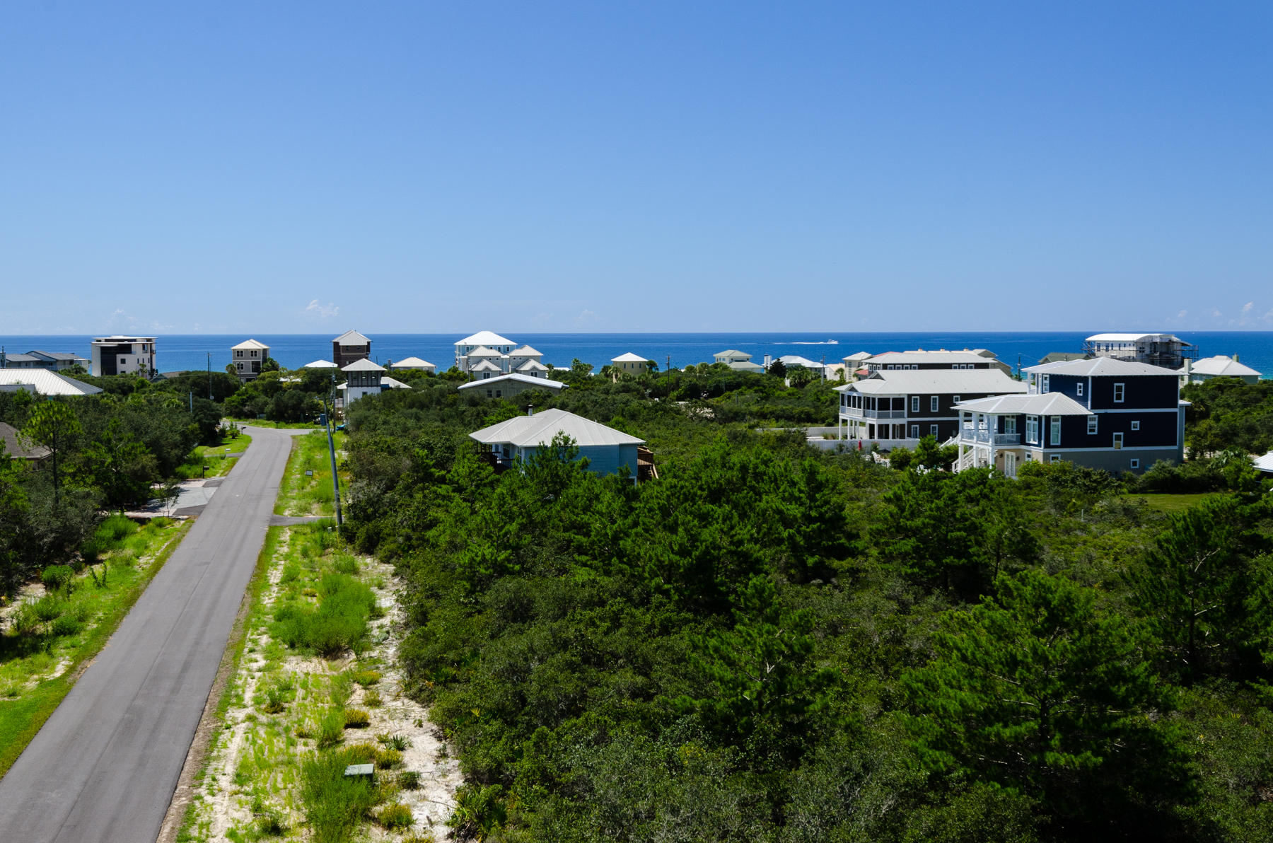 Build at the beach with the Gulf in sight! Gulf views possible from a 3rd story or tower. This vacant lot is available less than a half mile to the Gulf. Located along scenic 30-A, this vacant lot awaits in the area between one of the few rare coastal dune lakes (Camp Creek Lake) and Alys Beach. Here, there is no build out time and no HOA or specific architectural guidelines other than the standard Walton County height and building setbacks. Location is a short distance to many restaurants, shopping and entertainment in Alys Beach, Rosemary Beach and the latest HUB just west of Camp Creek Lake. Public beach access located across from Seacrest Drive (West from Brenda Lane). ***Buyer is responsible for personally verifying details about this property.