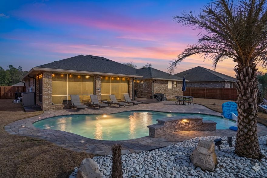 Beautifully upgraded all-brick home with custom features and a private backyard oasis! Built in 2019 by Adams Homes, this property showcases the largest floorplan in the neighborhood and has been thoughtfully enhanced so it feels anything but builder-grade.Inside, the owners have elevated the space with updated lighting fixtures and hardware throughout, along with a custom fireplace and accent walls that create a warm focal point in the living and dining room. The home feels polished, intentional, and move-in ready.Step outside and you'll find where this property truly shines. The backyard features a gorgeous gunite pool surrounded by a paver patio, creating the perfect space for relaxing or entertaining. A spacious Florida room adds additional living space and allows you to enjoy the outdoors comfortably year-round. Gutters have also been added for practicality and long-term care.

Pride of ownership is evident throughout this beautifully maintained home, thanks to highly diligent homeowners who have taken exceptional care of the property.

If you've been looking for a newer home with custom touches, a standout floorplan, and an incredible backyard, this one deserves a spot at the top of your list.