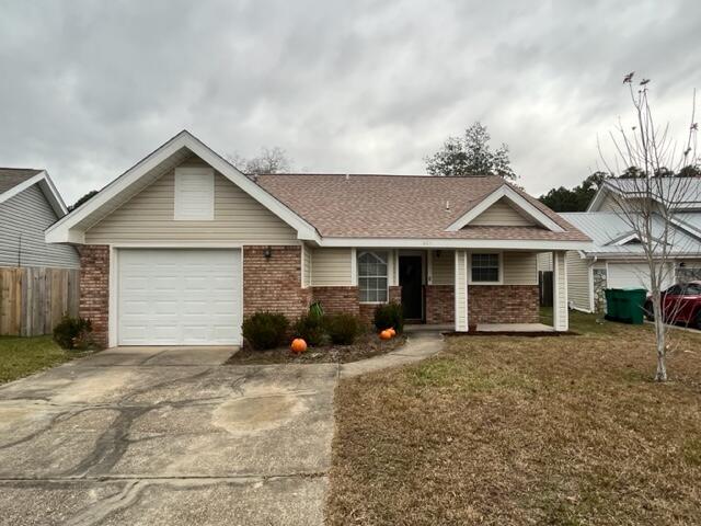 Adorable, well-maintained home, central to everything in FWB.  Located directly between the bases, this home has everything you are looking for.  Large living room with vaulted ceiling and fireplace, well equipped kitchen that opens to dining area and LR.  The 3 bedrooms are all carpeted with tile in the common areas.  The completely fenced backyard is spacious and has a nice patio for your enjoyment.  There is also a 1 car garage with extra wide driveway for second vehicle.  Washer and dryer included for your use.  Schedule your viewing today.