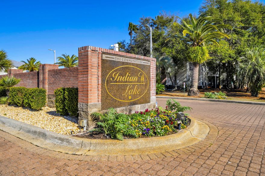 This spacious and inviting 1-bedroom, 1-bath condo features the largest one-bedroom floor plan in the Indian Lake community. Situated on the 2nd floor, this unit offers a spacious and open layout filled with beautiful natural light. Enjoy relaxing on the private balcony overlooking serene green space, complete with an exterior storage closet for added convenience. Inside, tile flooring runs throughout, and the generously sized primary bedroom includes a walk-in closet. Community amenities include a swimming pool, fitness center, and dedicated boat parking. Ideally located next to Morgan Sports Complex and the Destin Dog Park, with Destin's beautiful beaches just a short drive away.