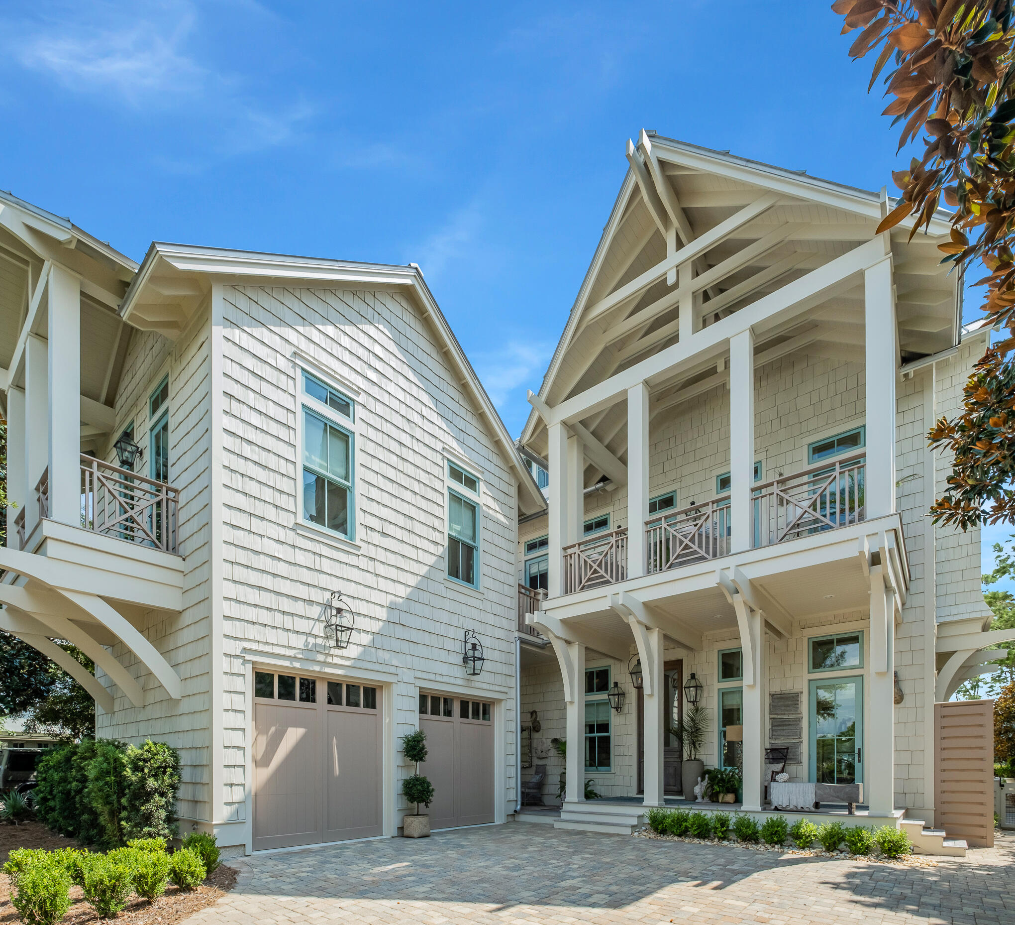 Reigning on one of the most sought-after homesites in the Lake District of Watercolor, this impressive edifice is framed by Western Lake and the surrounding picturesque vegetation. Executed by the renowned architect Dawn Thurber and the building team at Romair Construction, this inimitable architectural masterpiece spans four levels with over 5,400 of articulated living space.Upon initial approach you are greeted by a gas lantern-lit courtyard with fountain and spacious porch leading the way to the grand front door and foyer. Adorned with Venetian plaster and antique beams, the stately living and dining areas open up to the Chef's kitchen boasting custom cabinetry, a professional appliance suite, and an oversized island.