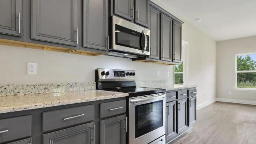 $7500.00 towards closing costs with the use of our in-house lender for financing! THREE CAR GARAGE! This open concept home features a 3 car garage with 4 bedrooms and a study or office. It also has a separate formal dining area off the family room. The interior will be finished with engineered vinyl plank flooring, carpet in the bedrooms, hand painted cabinets, stainless steel appliances, granite countertops, and our newly introduced smart home package. The exterior is 4 sided brick and also comes with irrigation and rust tank for easy maintenance lawn care. The rear covered patio backs up to wooded preservation area and is a great space for outside enjoyment and privacy.