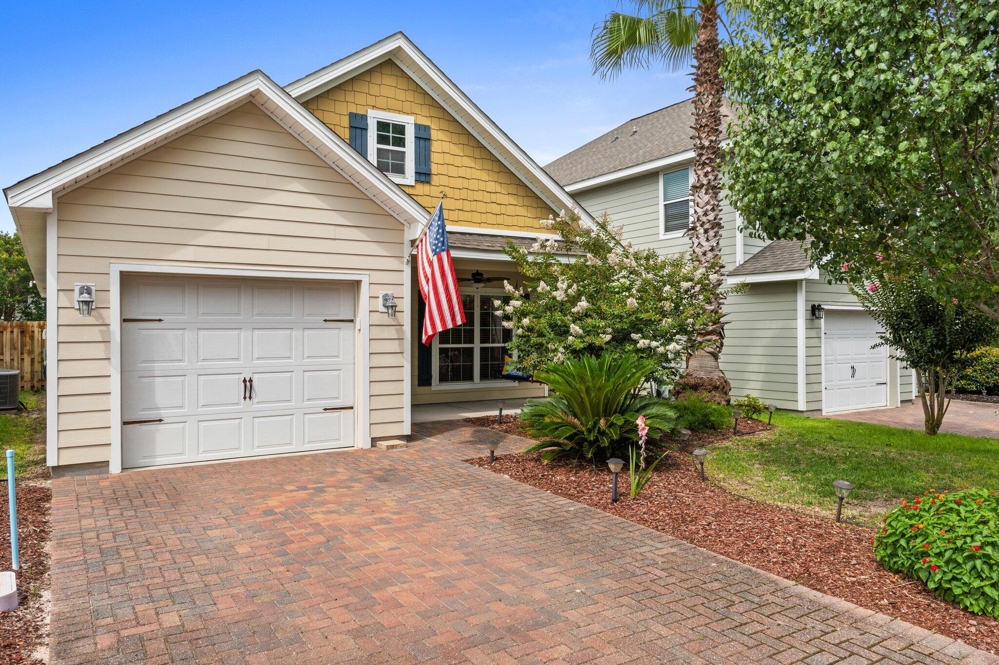 Welcome to 102 Turtle Cove, a delightful home situated in the desirable Turtle Cove at Lake Powell community. The neighborhood is located at the entrance of Wild Heron on the west end of Panama City Beach This property offers an exciting opportunity for those looking to personalize and add their own touches. This home features a versatile floor plan with 1323 square feet of freshly painted living space, including 3 bedrooms and 2 bathrooms, If you are looking for a primary home or a second vacation home, this is the one to see. There is a bonus room that can be used for a dining room or office space. The shaded front porch has a swing to enjoy sunsets and a glass of sweet tea! The backyard offers potential for transformation into a serene outdoor retreat. Enjoy this friendly community that has resort-style amenities with access to a community pool, tennis courts, pickle ball, fishing dock, and clubhouse. Additionally, the property is conveniently situated for shopping and dining options at 30A or Pier Park. 102 Turtle Cove is only 1.1 miles from Beach Access 86 so you can walk or even take a golf cart ride to enjoy the beach. This home is perfect for buyers looking to create their dream space in a vibrant community with all the conveniences of a beach lifestyle!