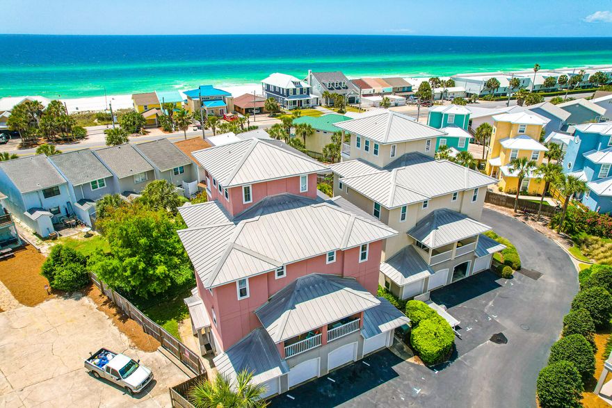 Enjoy the beach from this spacious Casa Del Mar townhome just steps from the water. This townhome is 4 stories with a private elevator. There are 3 bedrooms 3.5 baths and a loft that is currently used as a bunk room. The loft has the best views of the gulf! There are 3 balconies, a covered patio, and an outdoor shower. The home is sold fully furnished and rental ready. It also includes a 2 car garage. The complex is gated and includes a community pool. The seller reports $125,000 in annual rental income. This is a great opportunity for an investment that will also offer wonderful family memories to last a lifetime.