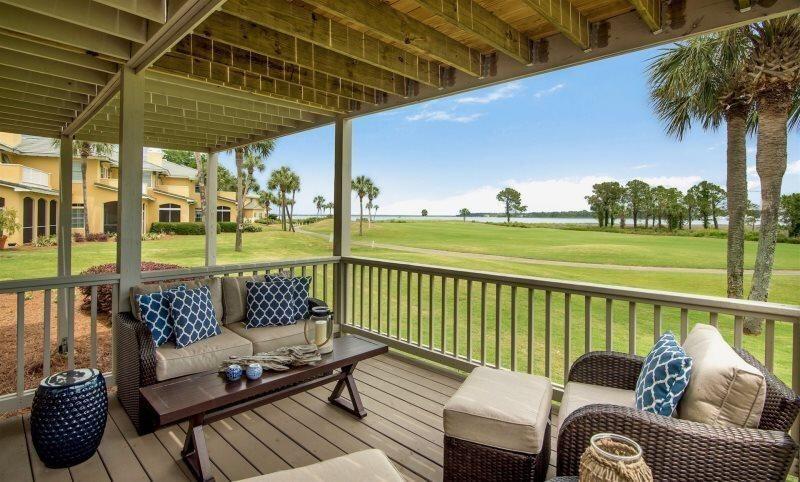 Can you say ABOVE AND BEYOND? Million-dollar views overlooking the Baytowne Marina, Links golf course, and the bay from 2 well positioned decks. INSIDE? The WOW factor continues with special attention to details - fit and finish is top-drawer. This is a move-in or rental-ready opportunity.! Enjoy the panoramic, 180 degree view of Choctawhatchee Bay, the signature 14th hole of the Links GC and the Village of Baytowne Wharf and Marina from either of the TWO decks! Stunning sunrises greet you each morning from this first floor, 2 bd, 2 ba, condo with a thoughtful split bedroom design. This property is located in the highly desirable Harbour Point neighborhood which boasts its own private community pool, a small enclave of just 48 condos and conveniently located on the Bayside.