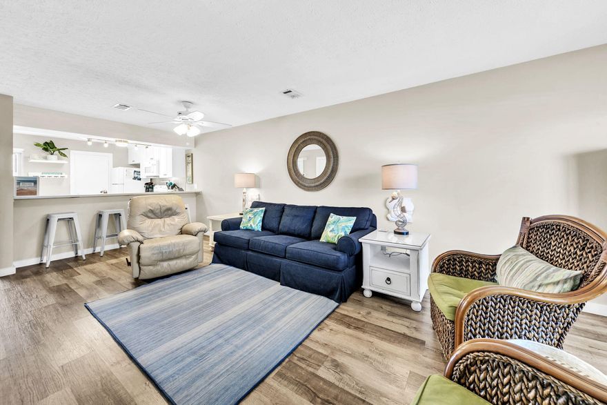 PROFESSIONAL PHOTOS COMING SOON - The only end unit currently available means you not only have just one side neighbor, but you also have superior patio spaces!  You will have your own private patio by the kitchen and will also have an additional patio off the 2nd bedroom to go along with all of the extra natural light!This lovingly maintained 2 bedroom 2.5 bath condo has so much to offer. Being offered fully furnished and turnkey, the unit has a half bath on the first floor as well as 3 storage closets, one of which is right as you walk into the unit so you can easily store your beach goods without trekking sand throughout the home. Not that sand would be hard to clean up since the entire unit features luxury vinyl plank flooring throughout. Walking into the unit you will see the open living space that leads into the kitchen with breakfast bar and quartz counter tops. In the kitchen is your first owner's closet.  The quaint dining area includes a generous pantry or closet and opens up to the patio overlooking the courtyard and with pool views. 
Onto the second floor, you have a split bedroom plane with the laundry closet in the middle as well as another owner's closet at the top of the stairs. Each bedroom has its own private bath, balcony, and two closets. The bedroom on the north side of the unit is where your additional balcony can be found. Since this is an end unit, the bedroom boasts a covered balcony with plenty of natural light. The ensuite bathroom features a larger vanity with sitting area and walk-in shower. The bedroom on the south side of the unit also features a covered balcony, with lovely views of the community pool. The ensuite bathroom includes a shower/tub combo as well as quartz counter tops which can be found in all of the bathrooms. 
Parking at Sandprints is easy with having an assigned parking space in front of your unit and overflow parking can be found throughout the complex. The community also offers a beautifully maintained pool and a spacious club house that can be used for special events. Sandprints is in a prime location being only two blocks from Pompano Joe's and the public beach access. Easily ride your bikes to the beach, or down Scenic Highway 98 to get to restaurants, shopping, and more. Being in the heart of Miramar Beach affords you easy access to so much in such a short distance like Silver Shells Outlet Mall, Surf Hut Restaurant, WinnDixie, and much more. 
