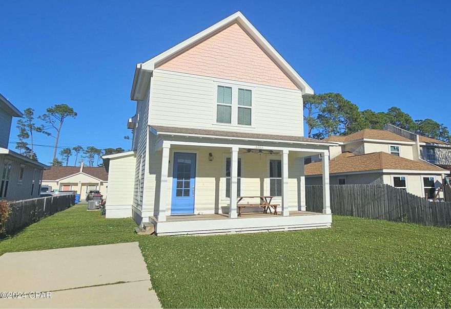 This beautiful beach residence boasts a prime location by the naval base, schools, eateries, and all the vibrant attractions of Panama City Beach. Notably, it stands out for its orientation facing North Lagoon and Poinciana Dr, both of which are smoothly paved. The home offers the added convenience of dual entrances and a rear garage entry, allowing for easy parking access at the front. Fitness enthusiasts will appreciate the adjacent county-maintained walking/jogging path along North Lagoon Drive, perfect for staying active. Inside, you'll find lofty 9-foot ceilings, two expansive covered porches for outdoor relaxation, dual Central A/C units for enhanced comfort and energy efficiency, a luxurious jetted bathtub in the master bathroom, and abundant storage options.