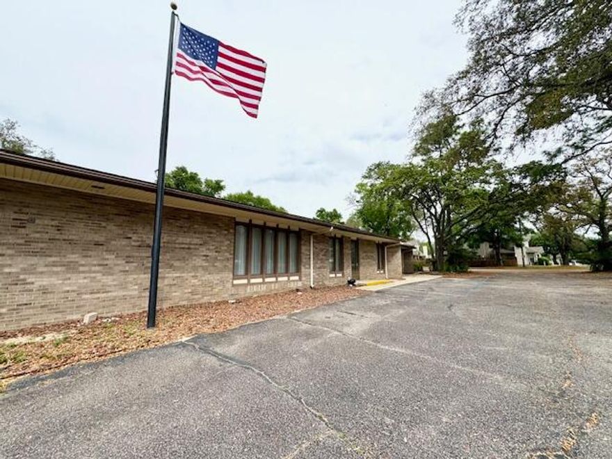 Located Between Eglin and Hurlburt, this property presents an incredible opportunity on the most active, new commercial area in Fort Walton Beach. The building has a kitchen, large open spaces and many offices as well. The property is in good shape and could be utilized for a variety of use. However, it is also 1.02 acres with a median cut and AADT of 31,524 and growing with the new Freedom Park development and ever growing base missions. Buyer to verify all measurements and pertinent information. Property is also available for lease.