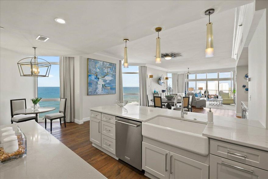 When it comes to  ultra luxe Gulf front living, the allure and stature of Regency Towers remains unrivaled.  Sprawling half of the ninth floor, this three-bedroom residence is the epitome of private coastal living. The recent remodel curated by the renowned designer Jill Doughty encompasses an open concept, clean lines, and a sophisticated yet minimalistic flair.  Upon initial entry, the grand vestibule leads the way to the foyer showcasing 10' ceilings, aged Oak hardwood flooring, and countless premium finishes that are carried throughout.