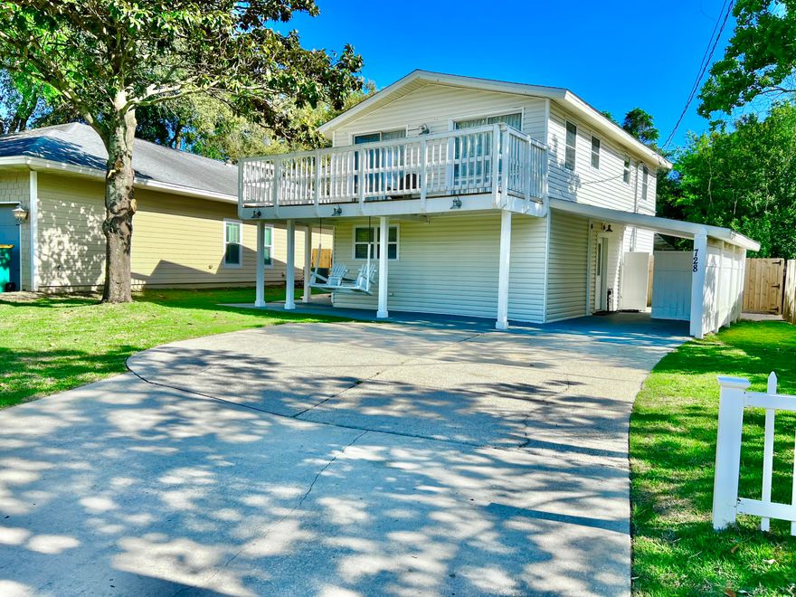 Treasured Florida cottage in the heart of Destin! Close to shopping, dining, and everything the fishing village offers. Sidewalk community provides ease of exercise/travel to public boat ramp, parks, ball fields, private airport, schools, and churches. No Hoa, No short-term rental. Outdoor kitchen complete with XL green egg, stainless steel griddle, ice maker, fridge, storage, and sink. Custom metal frame and concrete counter tops to accommodate bar seating for 8. Relax in privacy while soaking in hot tub overlooking magnificent oak tree. Privacy fence surrounding one of the deepest lots in Destin! Plenty of space to add pool behind outdoor kitchen or enjoy fire pit with oversized sitting area. Tile on first and real hardwood on second floor. Extra wide staircase, desk area on second floor landing as you enter the kitchen. Opens to oversized balcony shaded by beautiful magnolia tree on one side or soak up some sunshine. Natural light fills this home by the day and LED recessed lighting on dimmers by night. Paint is SW Agreeable gray and pure white trim, raised cable and electrical outlets. New A/C, exterior lighting on timer, front yard irrigation, paved front courtyard and backyard entry, stained concrete porch, additional driveway spaces to maximize parking.